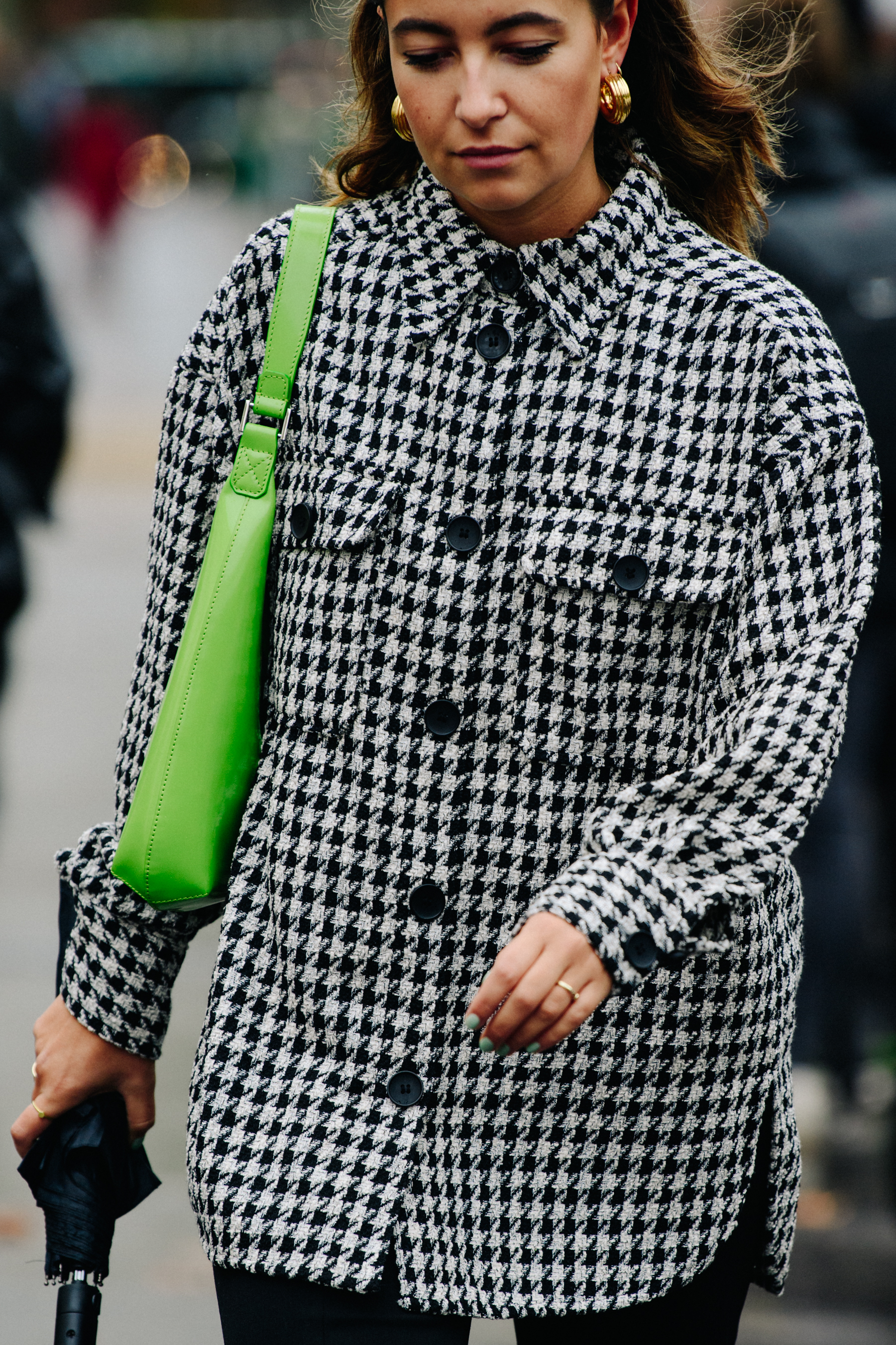 Woman carrying green bag