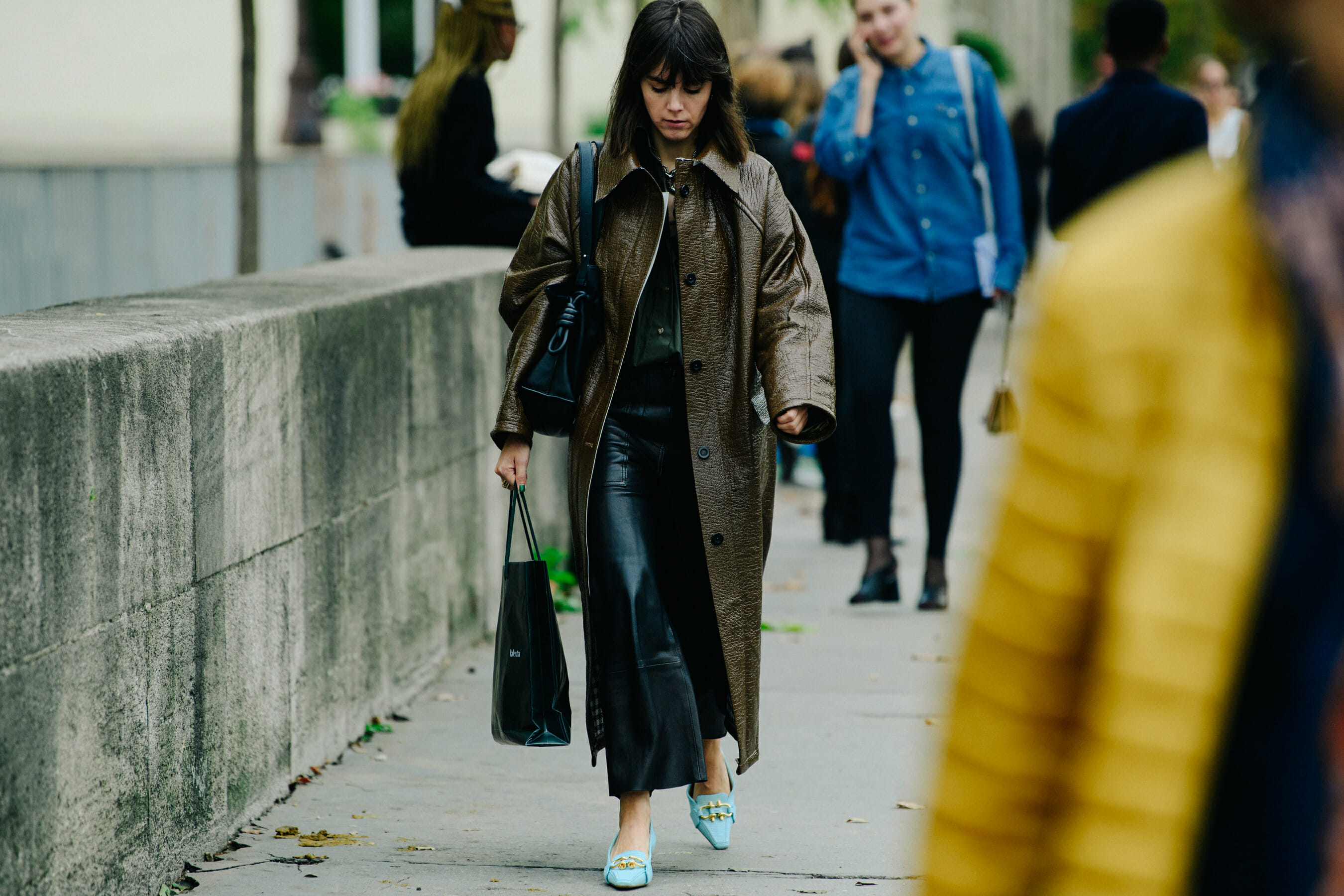 Woman wearing brown coat
