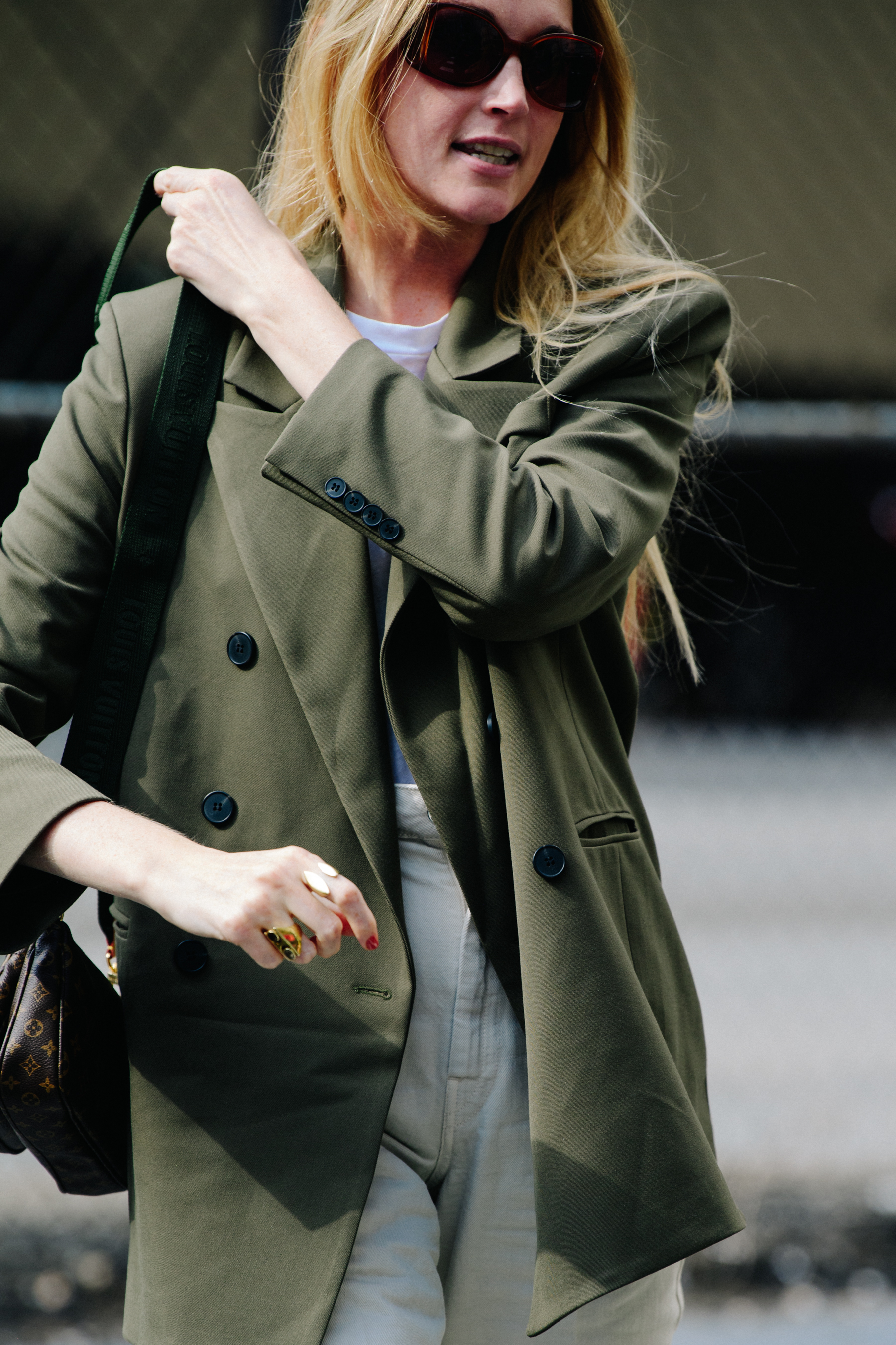 Woman wearing green jacket