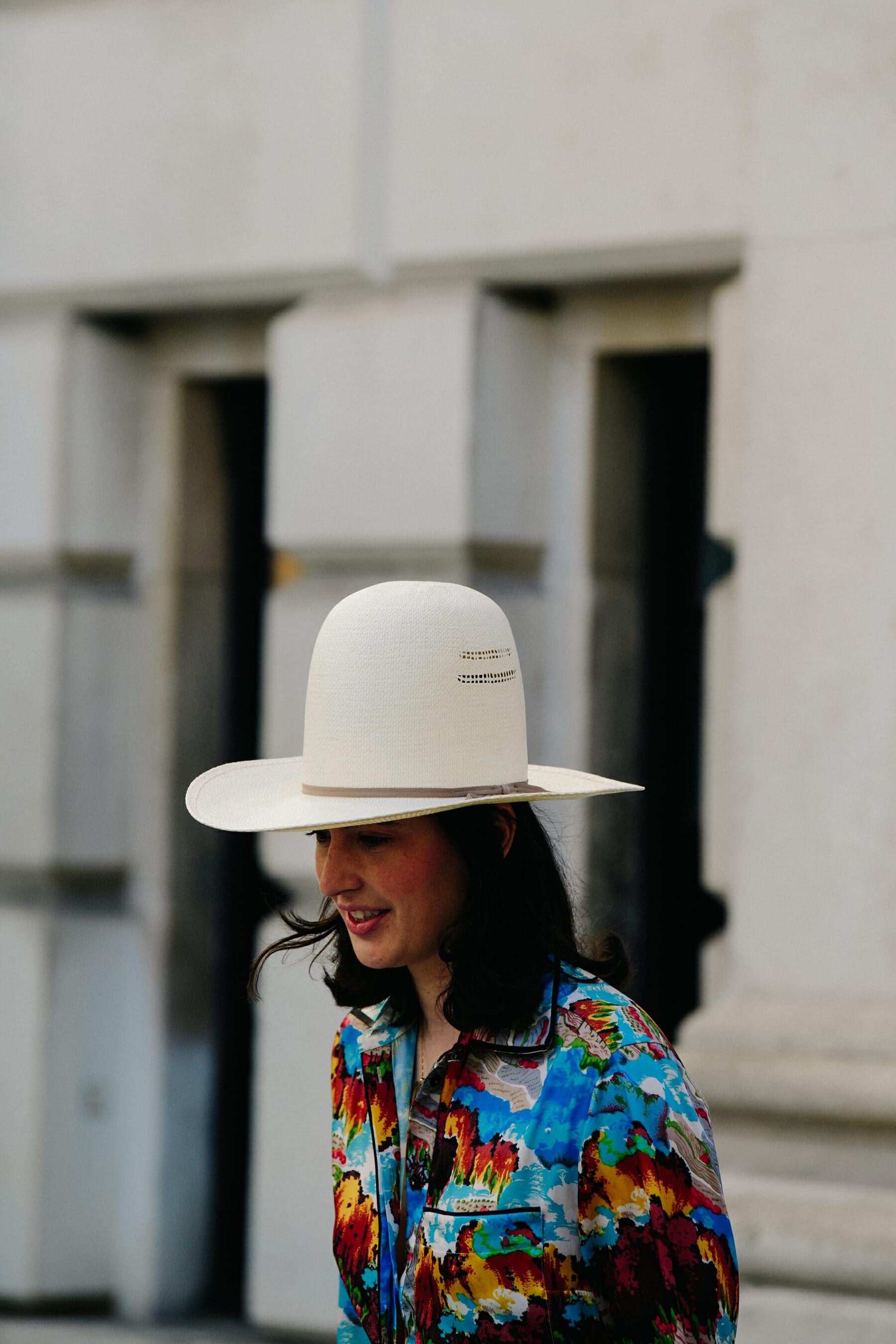 Woman wearing large cowboy hat