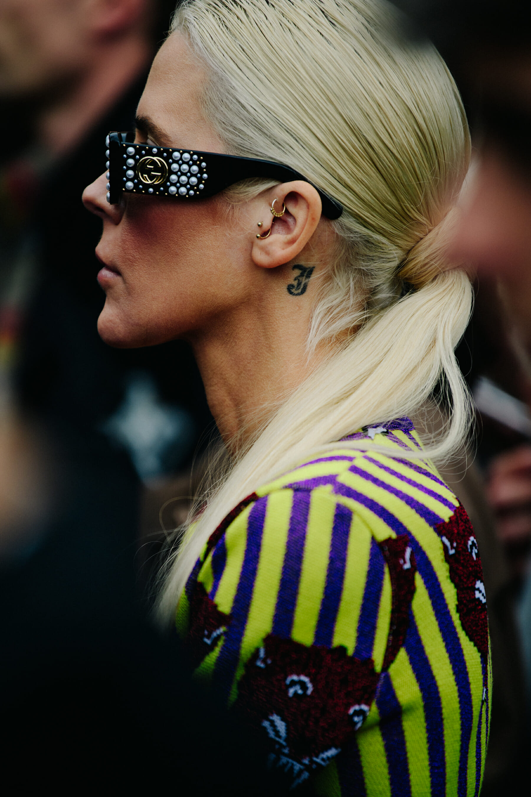 Woman wearing Gucci glasses