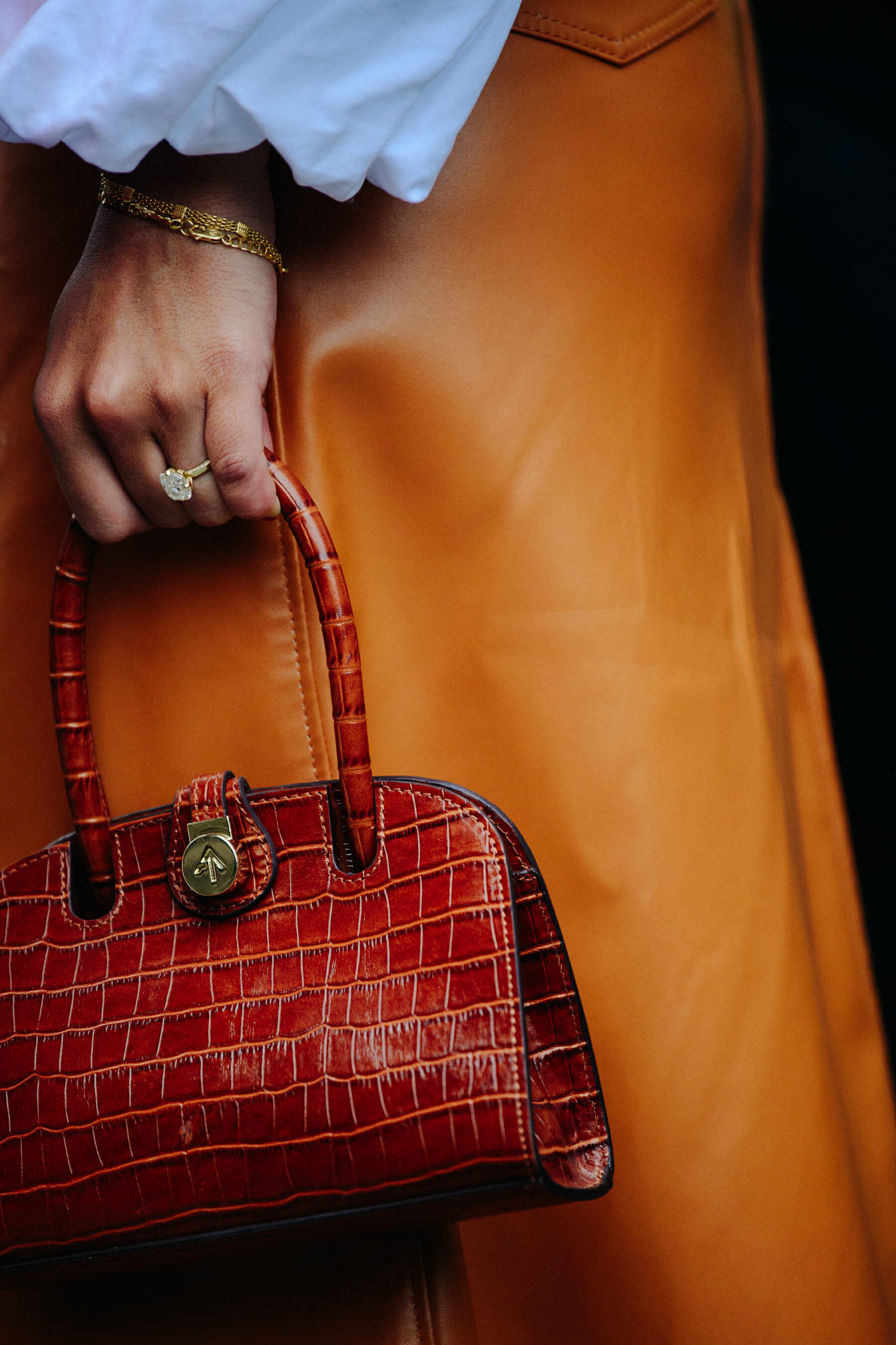 Woman wearing orange skirt