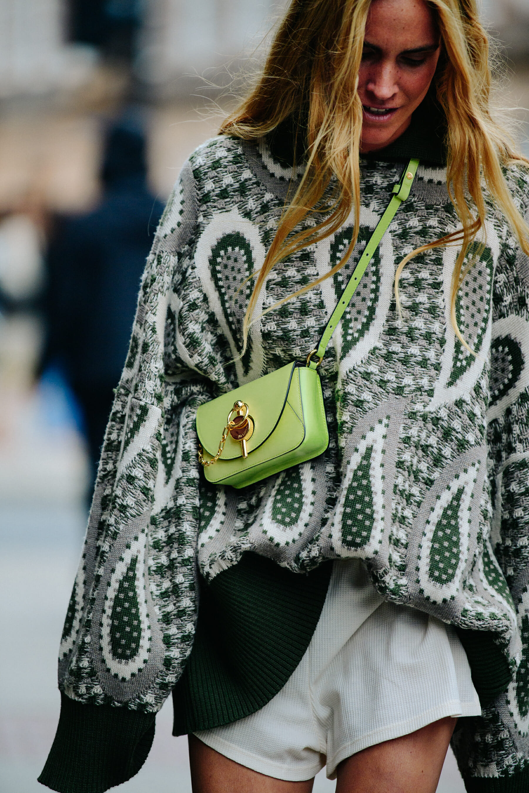 Woman carrying JW Anderson bag