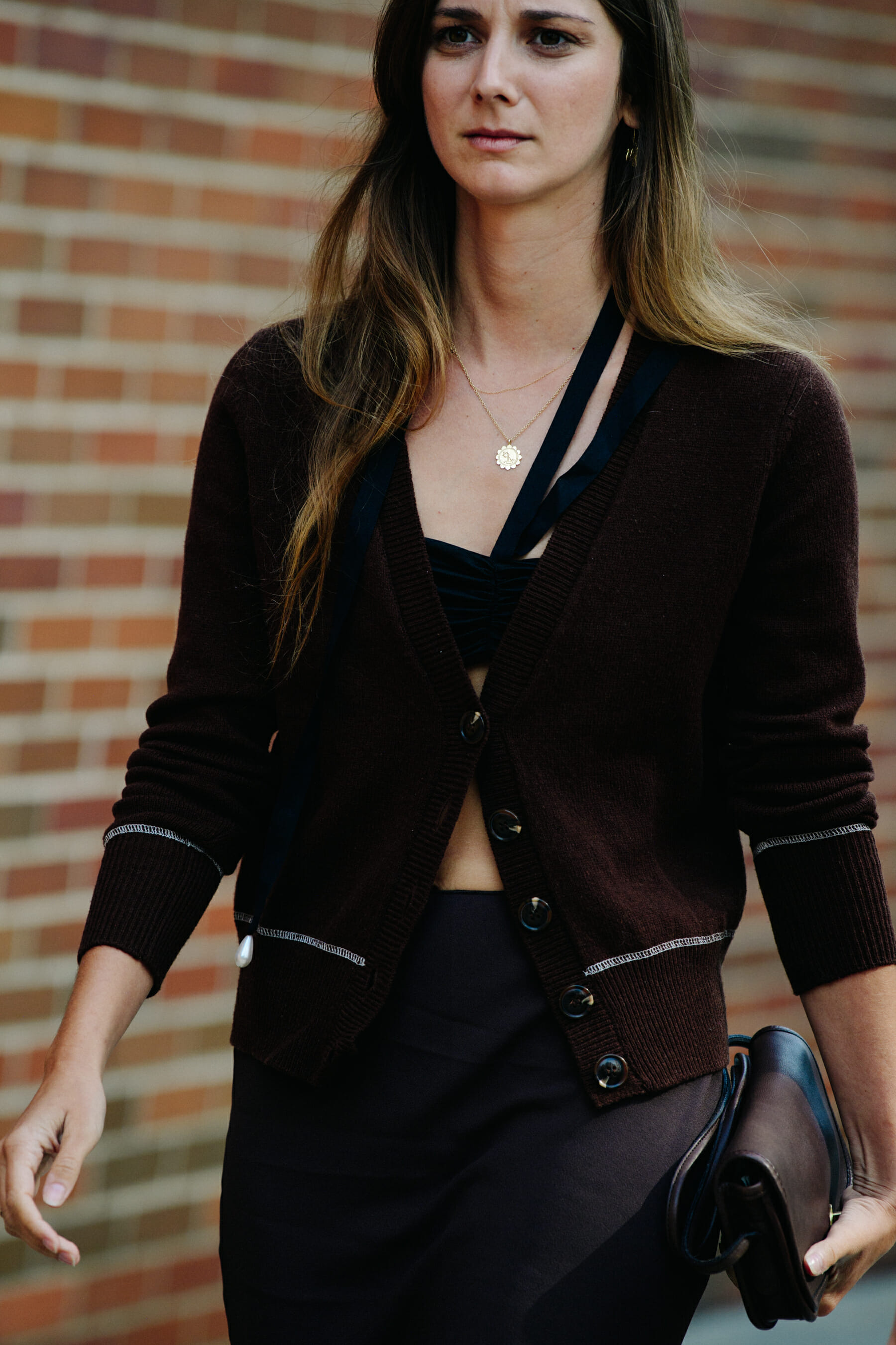 Woman wearing brown cardigan