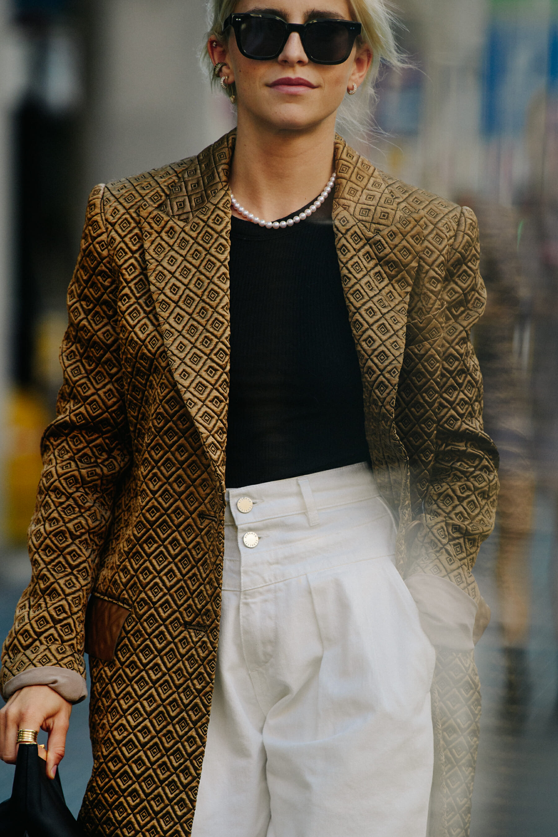 Woman wearing white pants