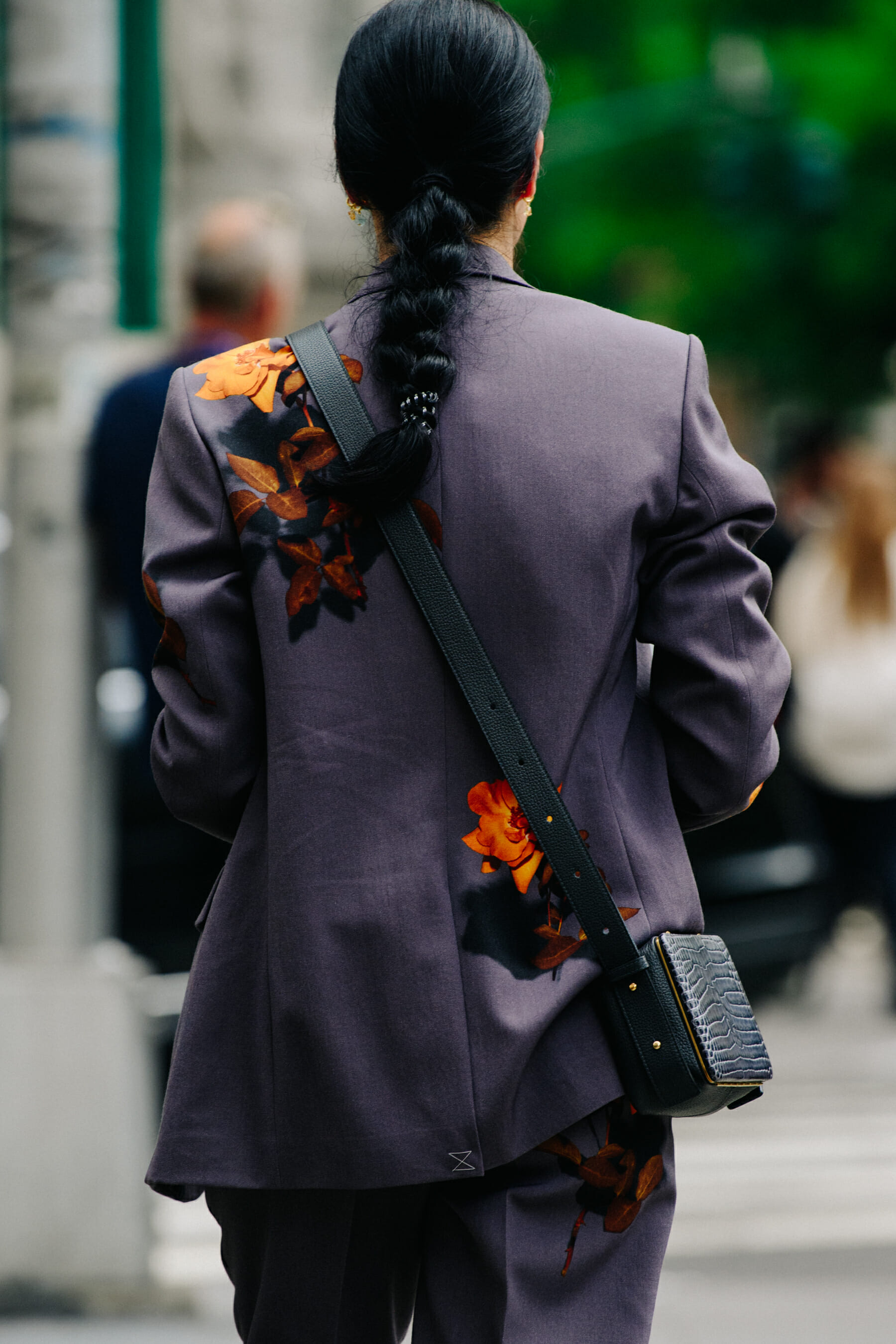 Woman wearing grey blazer