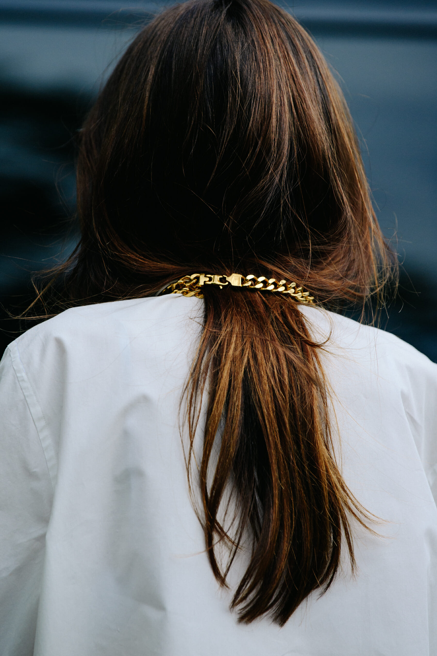 Woman wearing gold chain