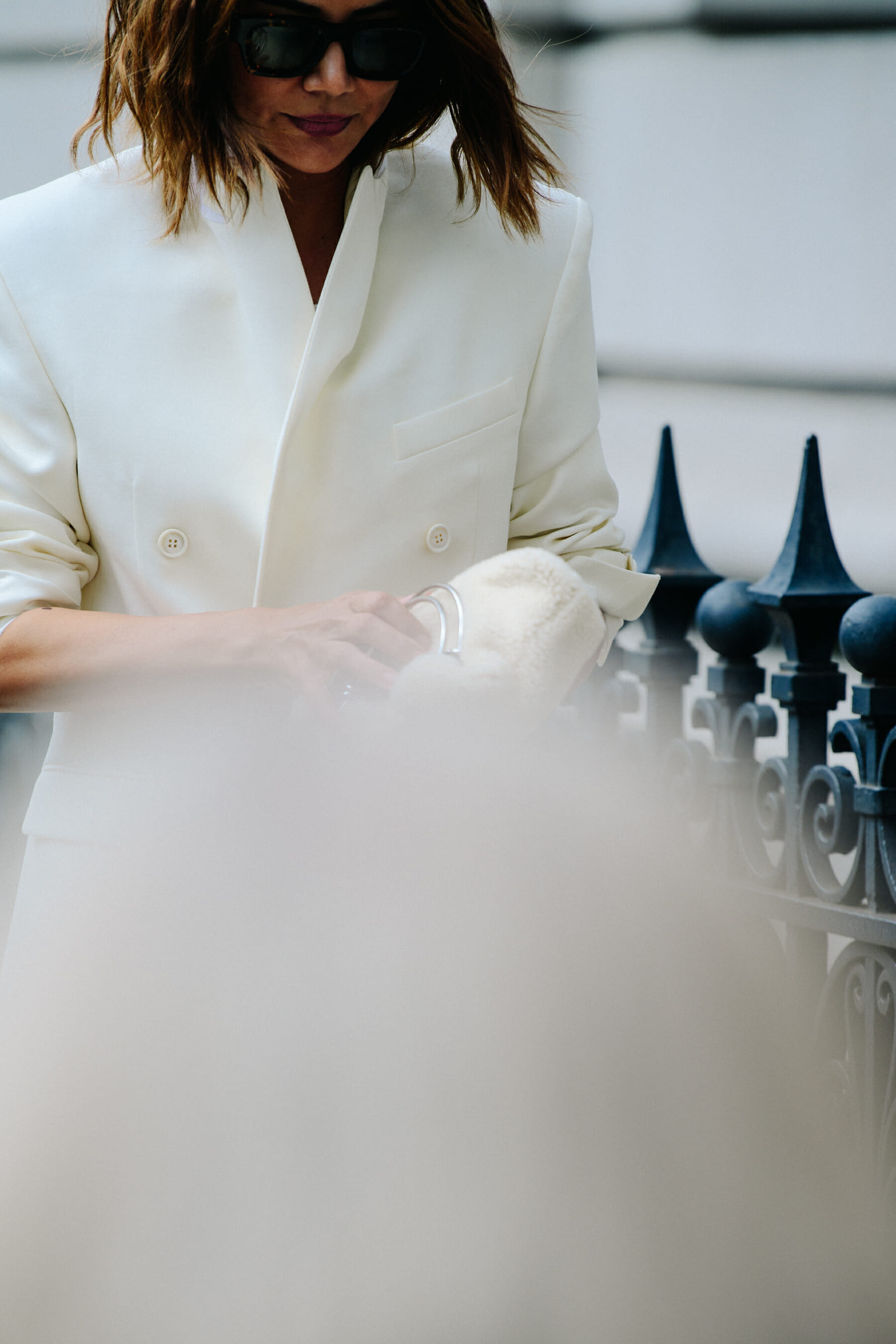 Woman wearing white suit