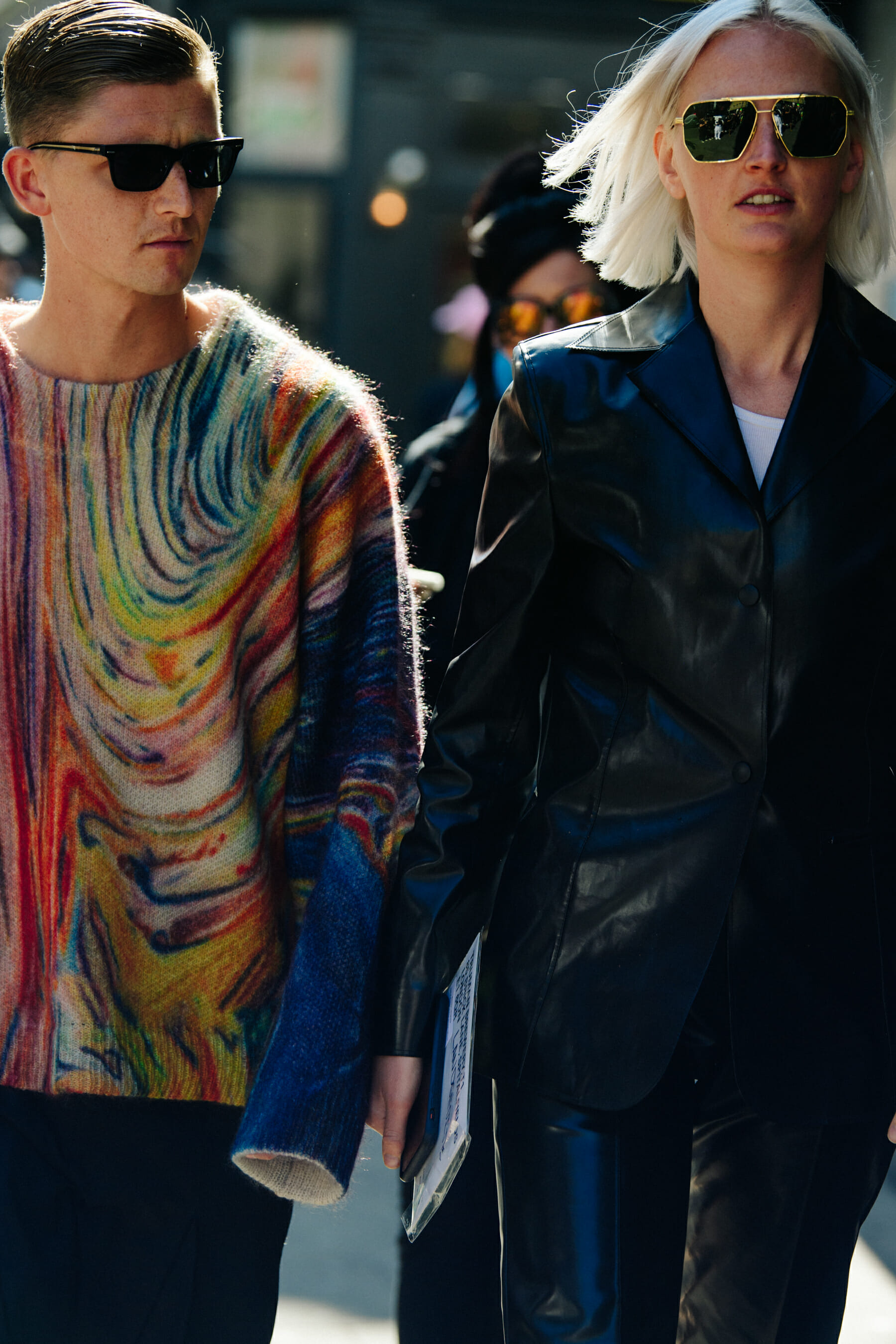 Couple wearing dark sunglasses