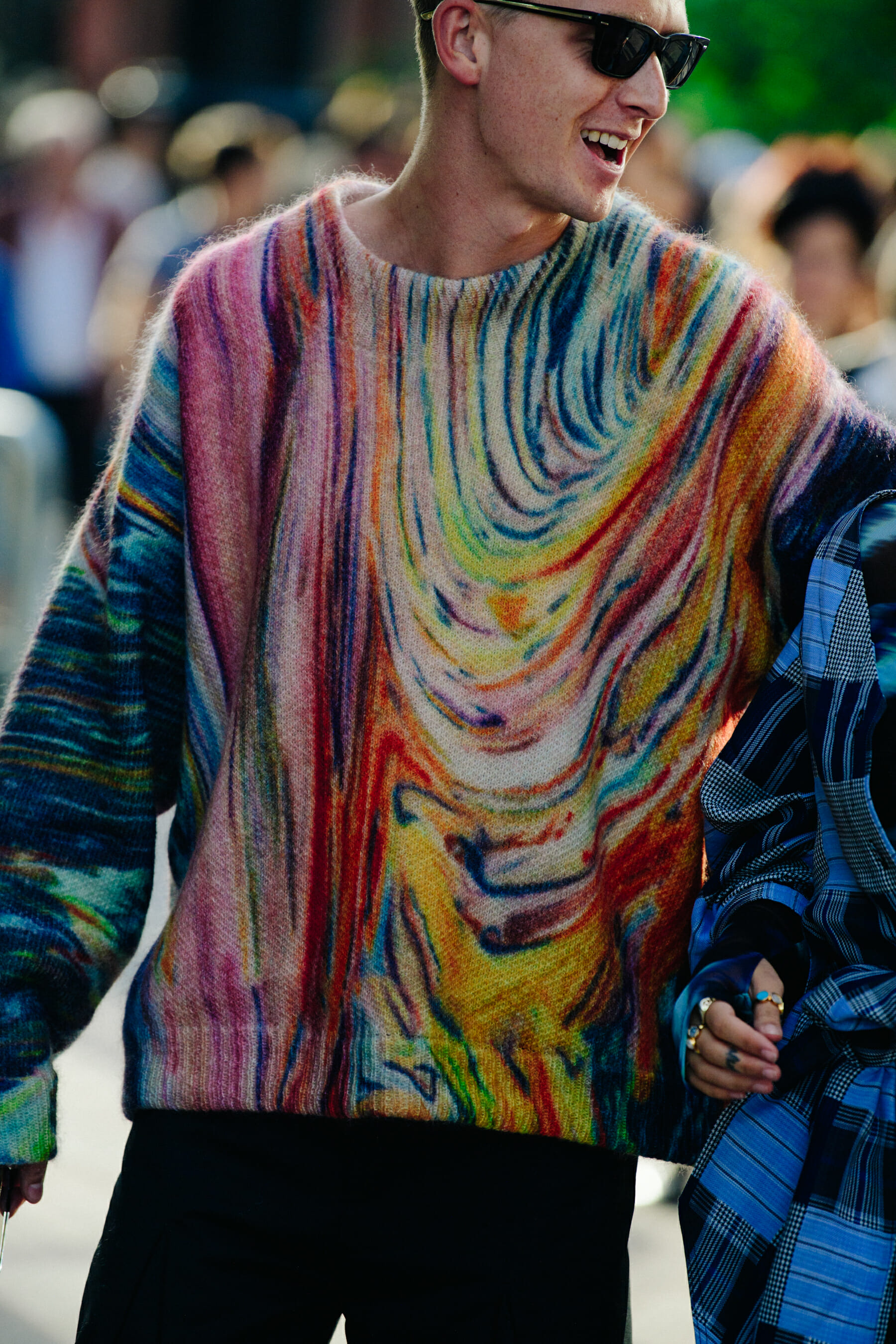 Man wearing colourful jumper