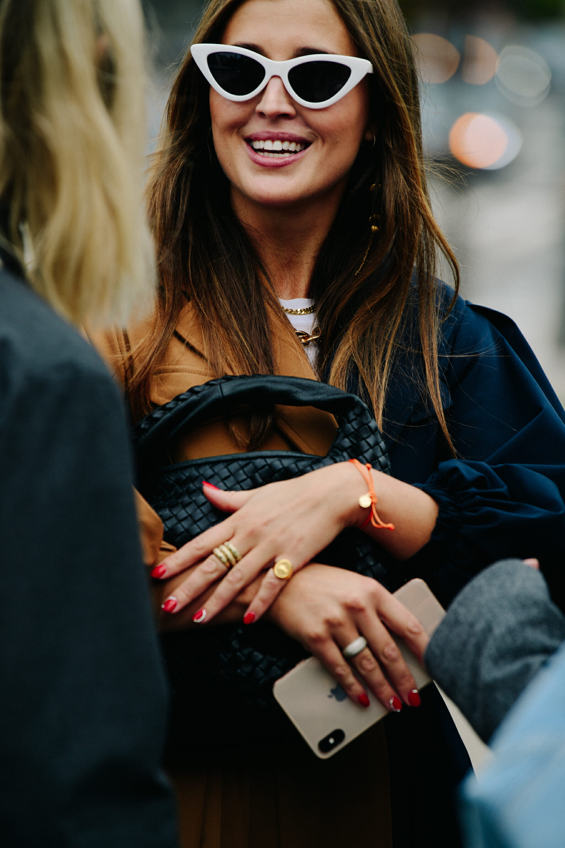 Woman wearing white sunglasses