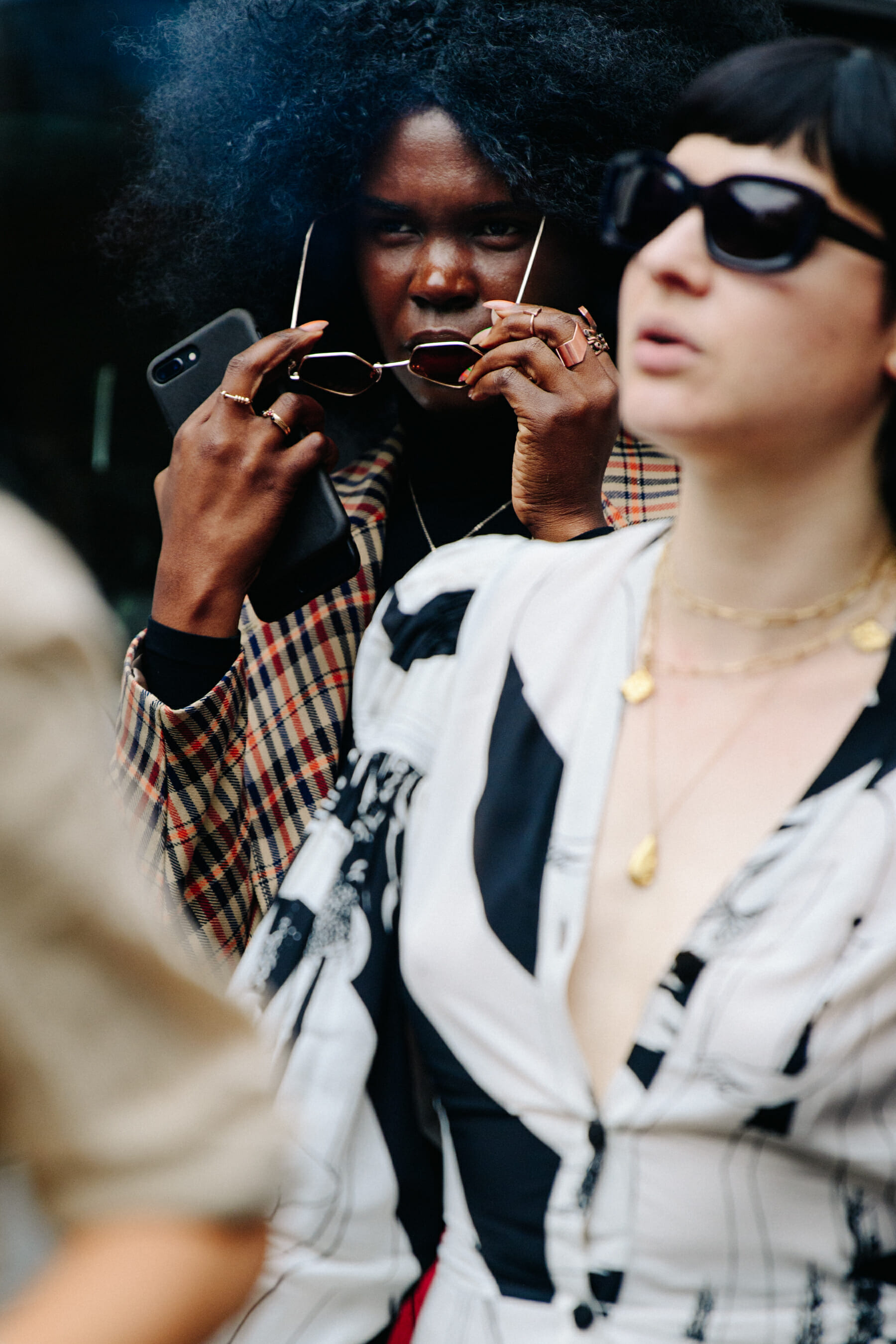 Woman wearing check jacket