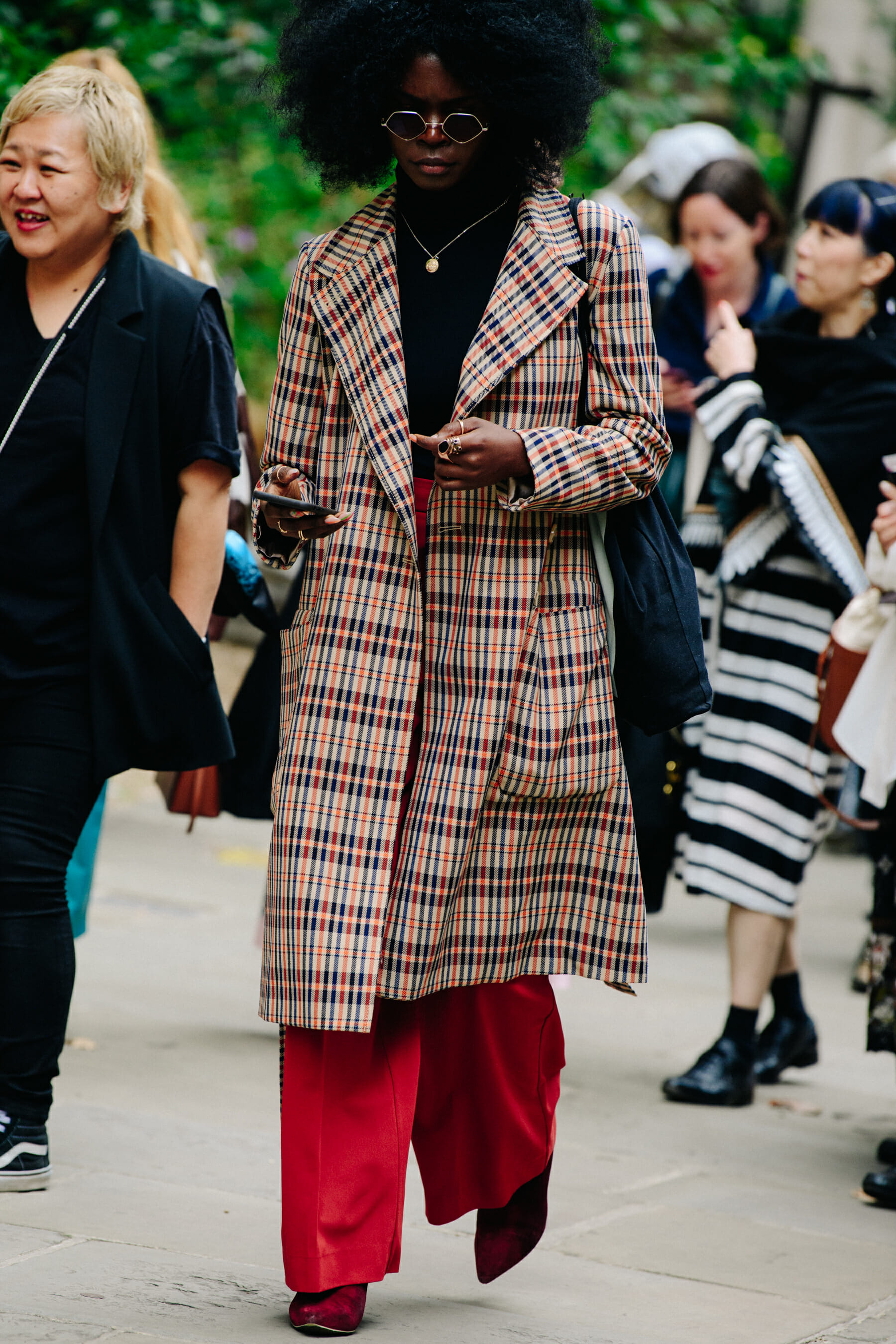 Woman wearing check jacket