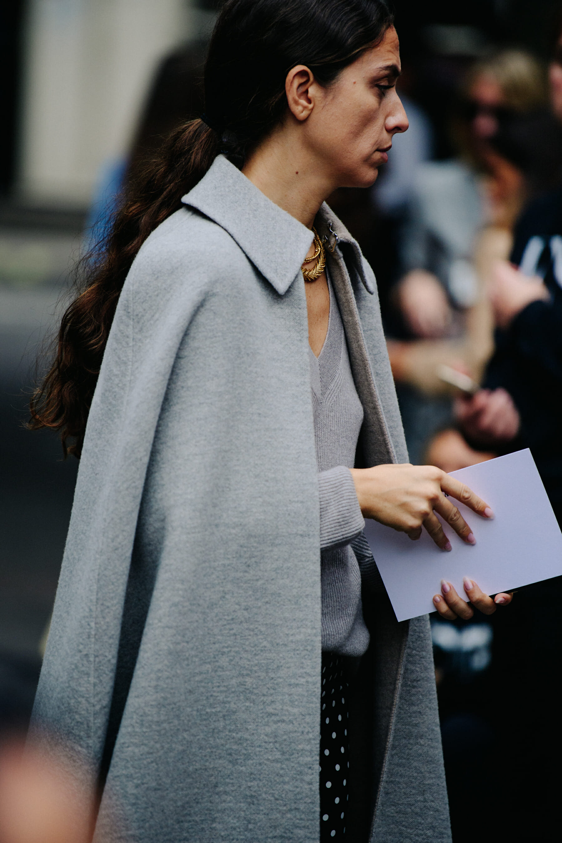 Woman wearing grey shawl