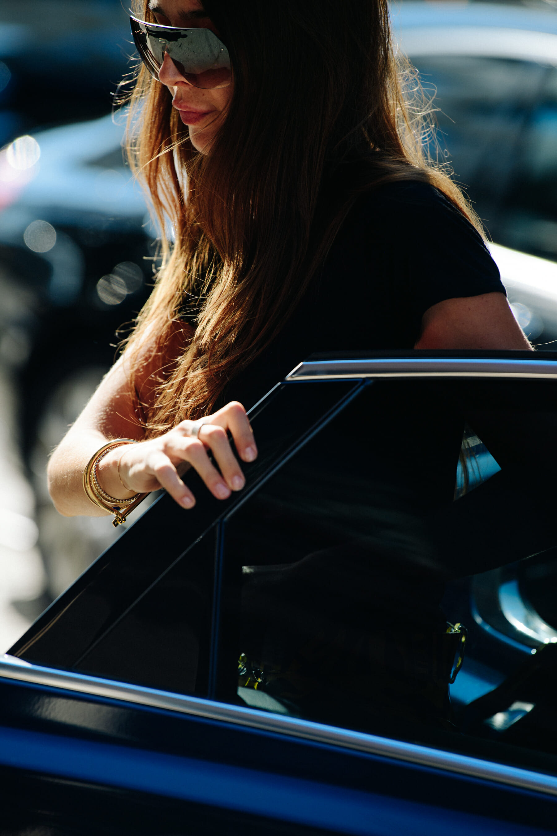 Woman wearing large sunglasses