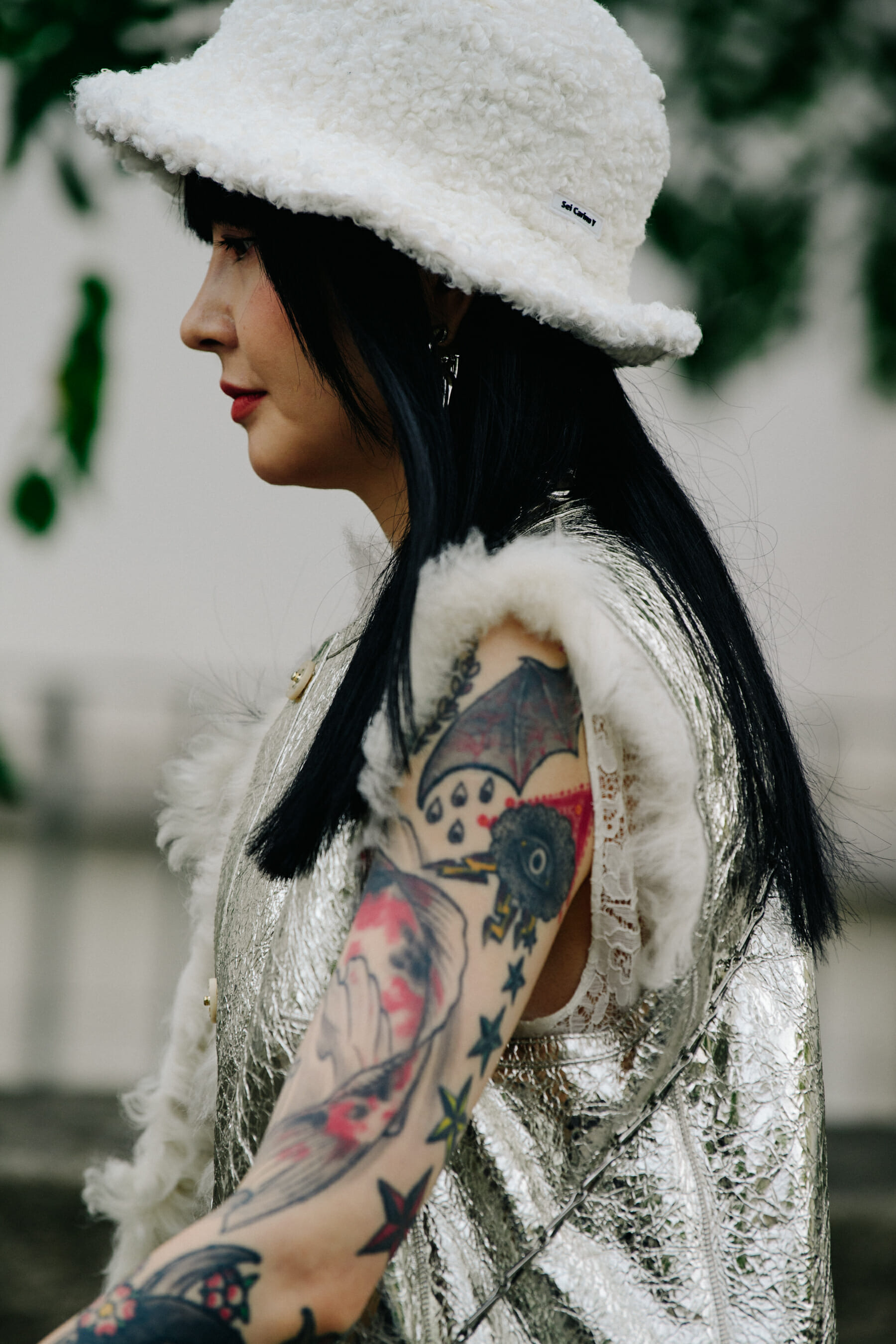 Woman wearing white hat