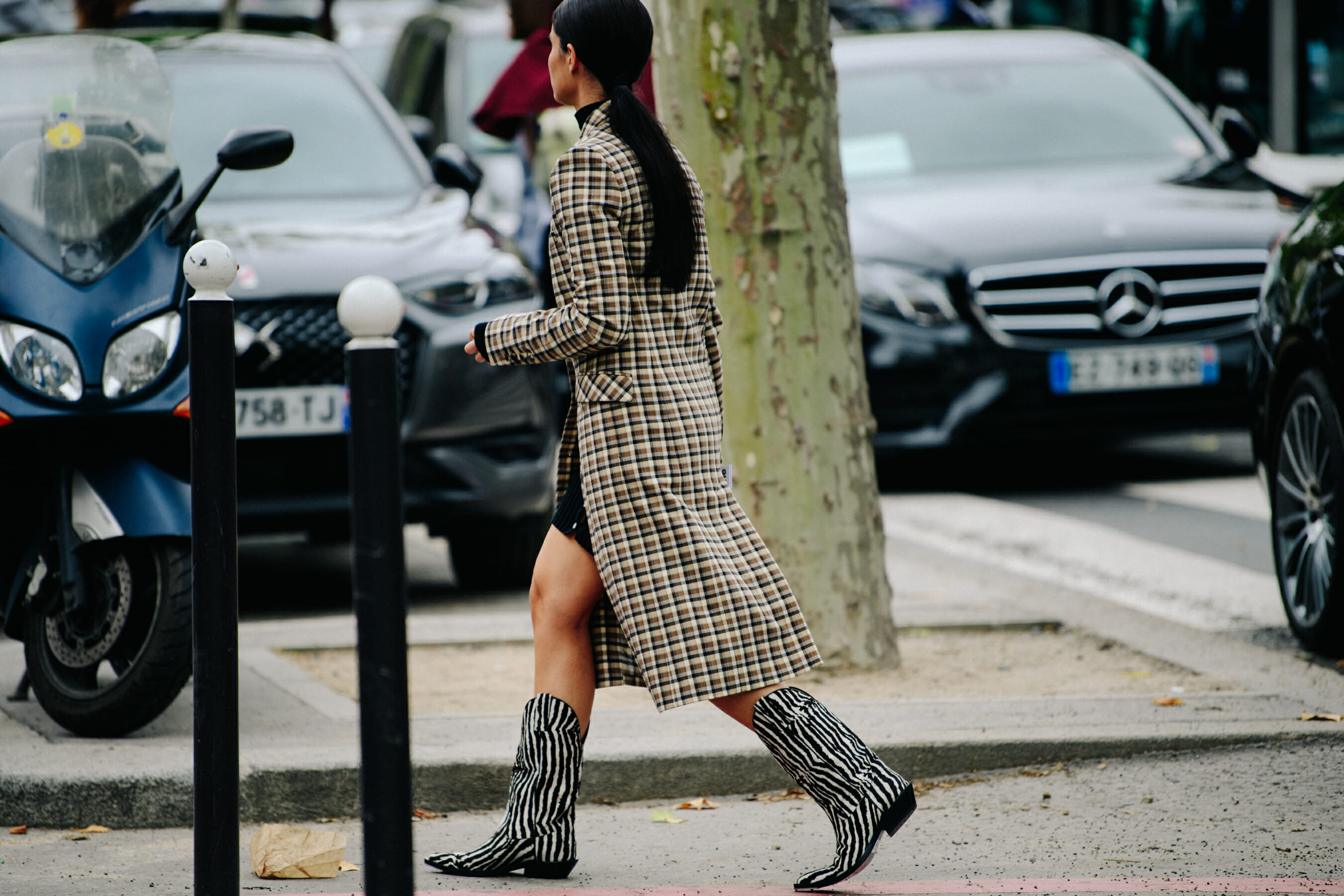 Woman wearing check coat