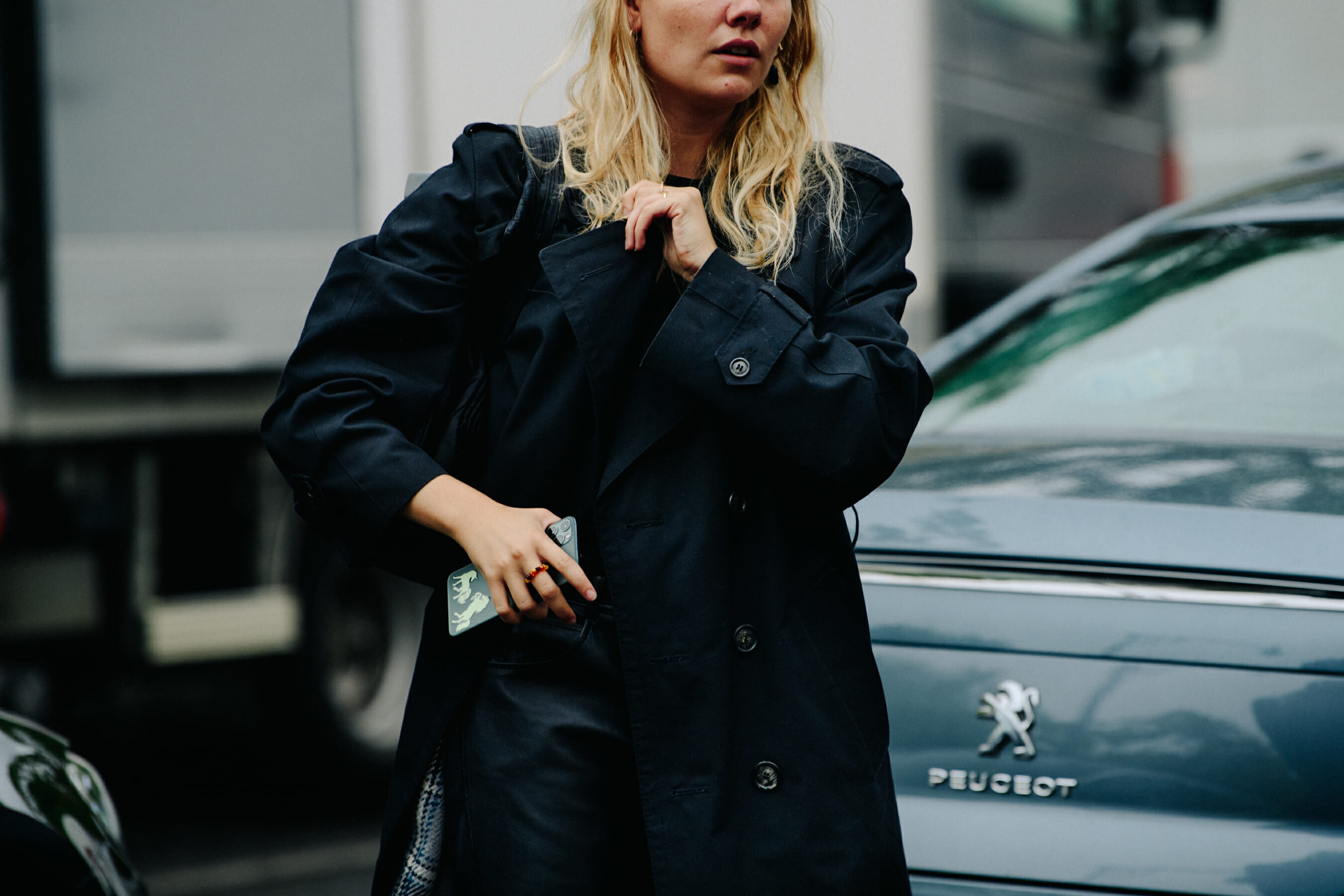 Woman carrying iPhone 11 Pro
