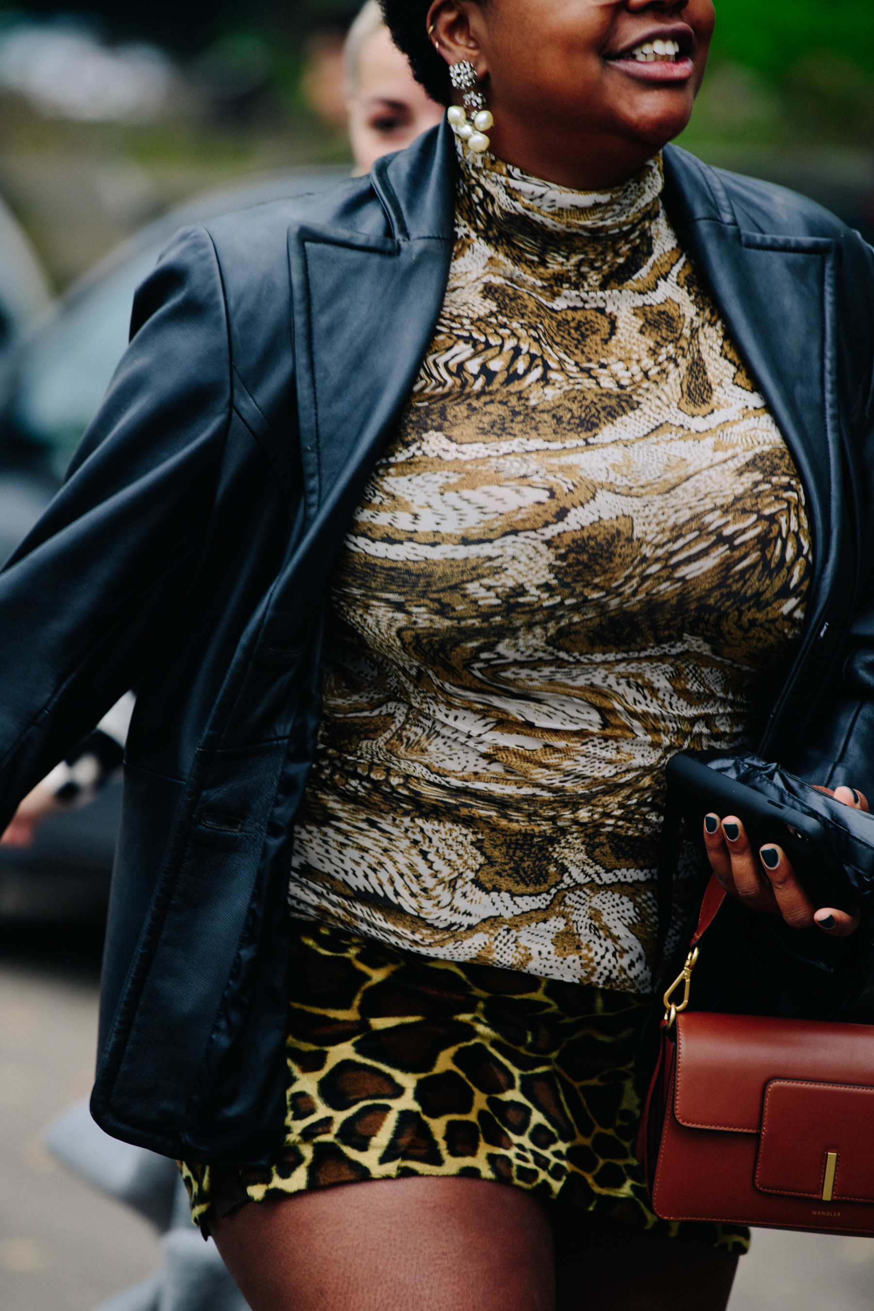 Woman wearing black leather jacket