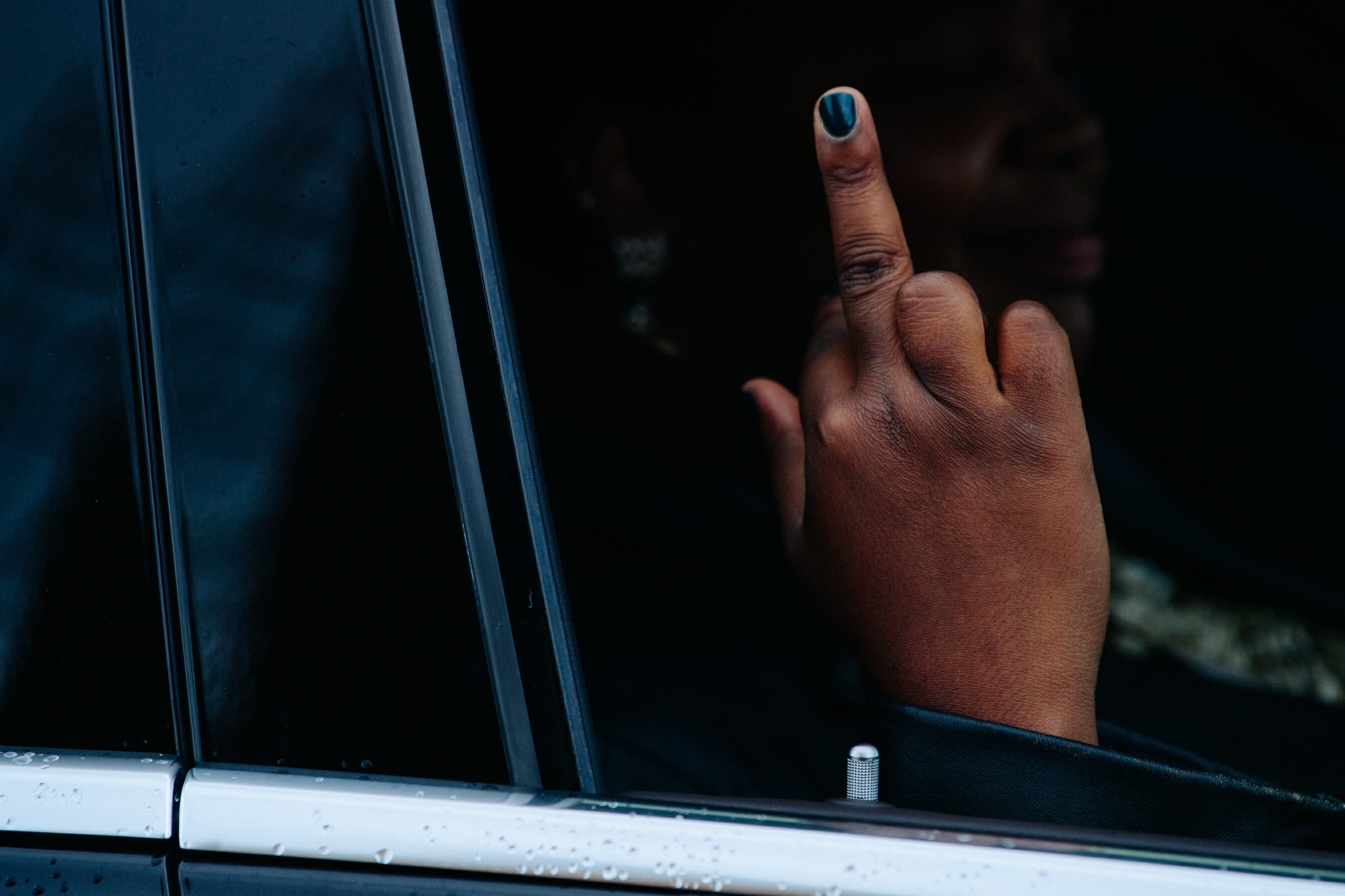 Woman swearing in car
