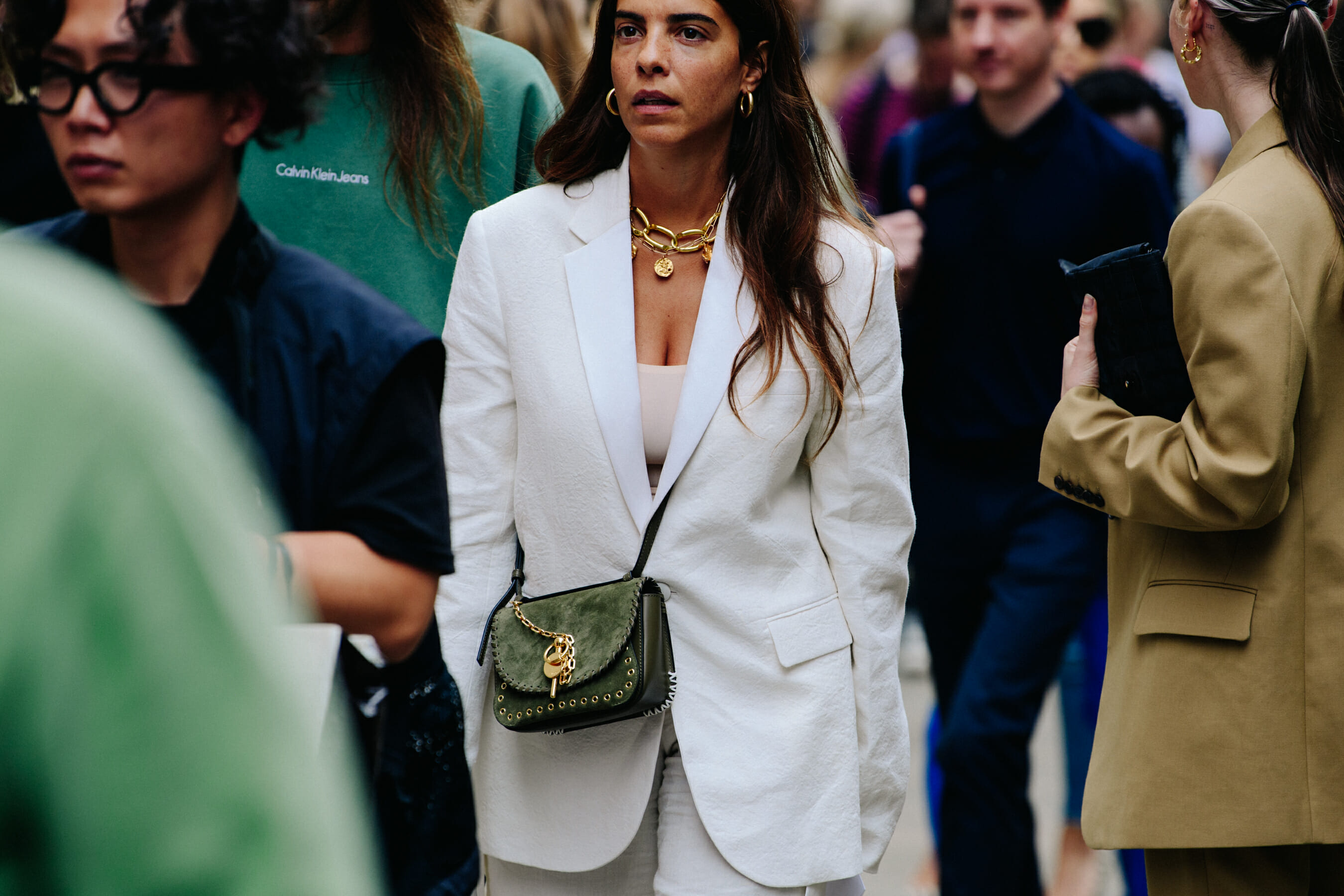 Woman wearing white suit