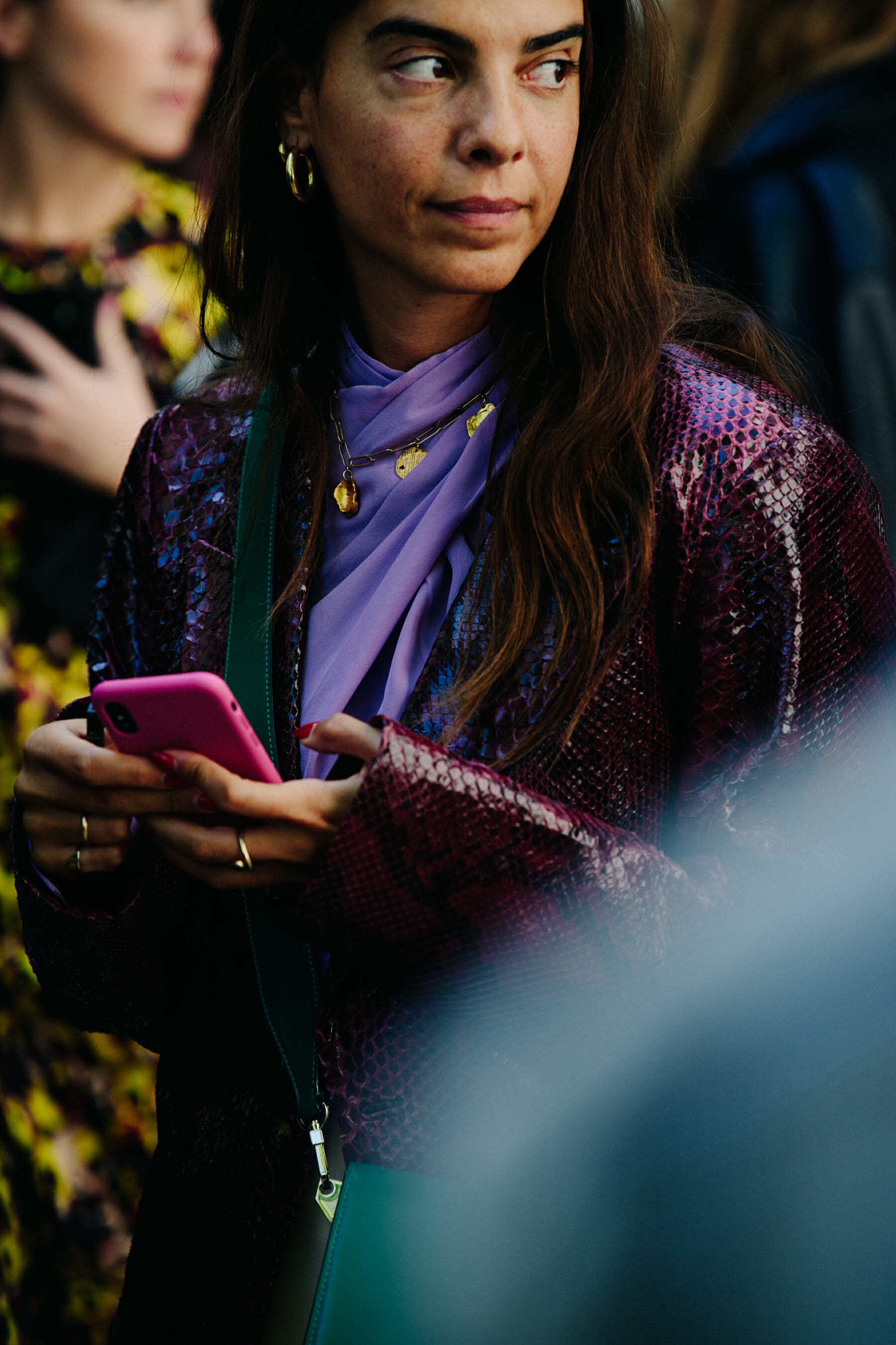 Woman wearing purple jacket