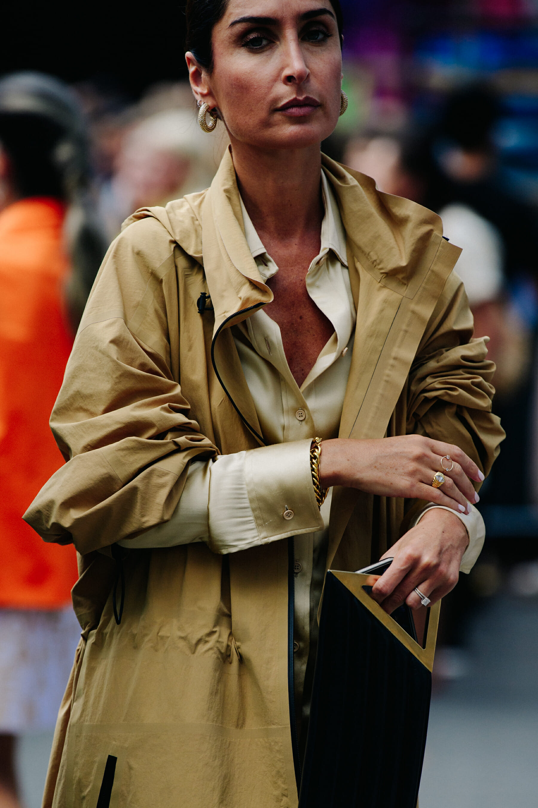 Woman wearing tan coat