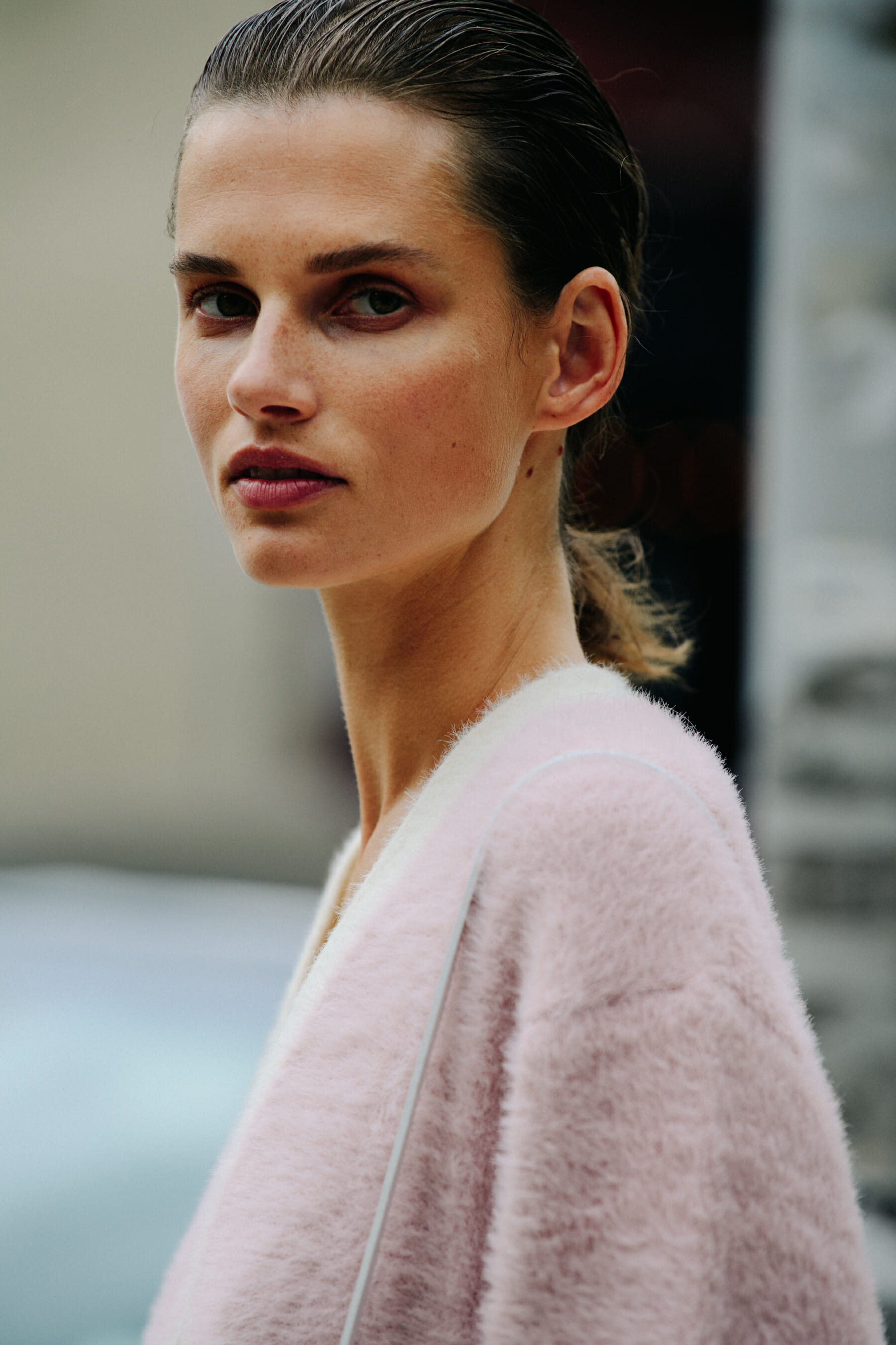 Model wearing pink cardigan