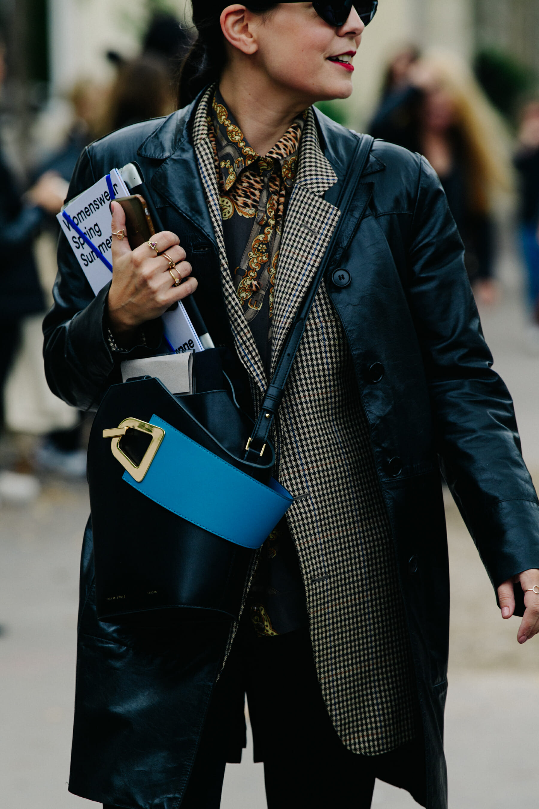 Woman wearing check blazer