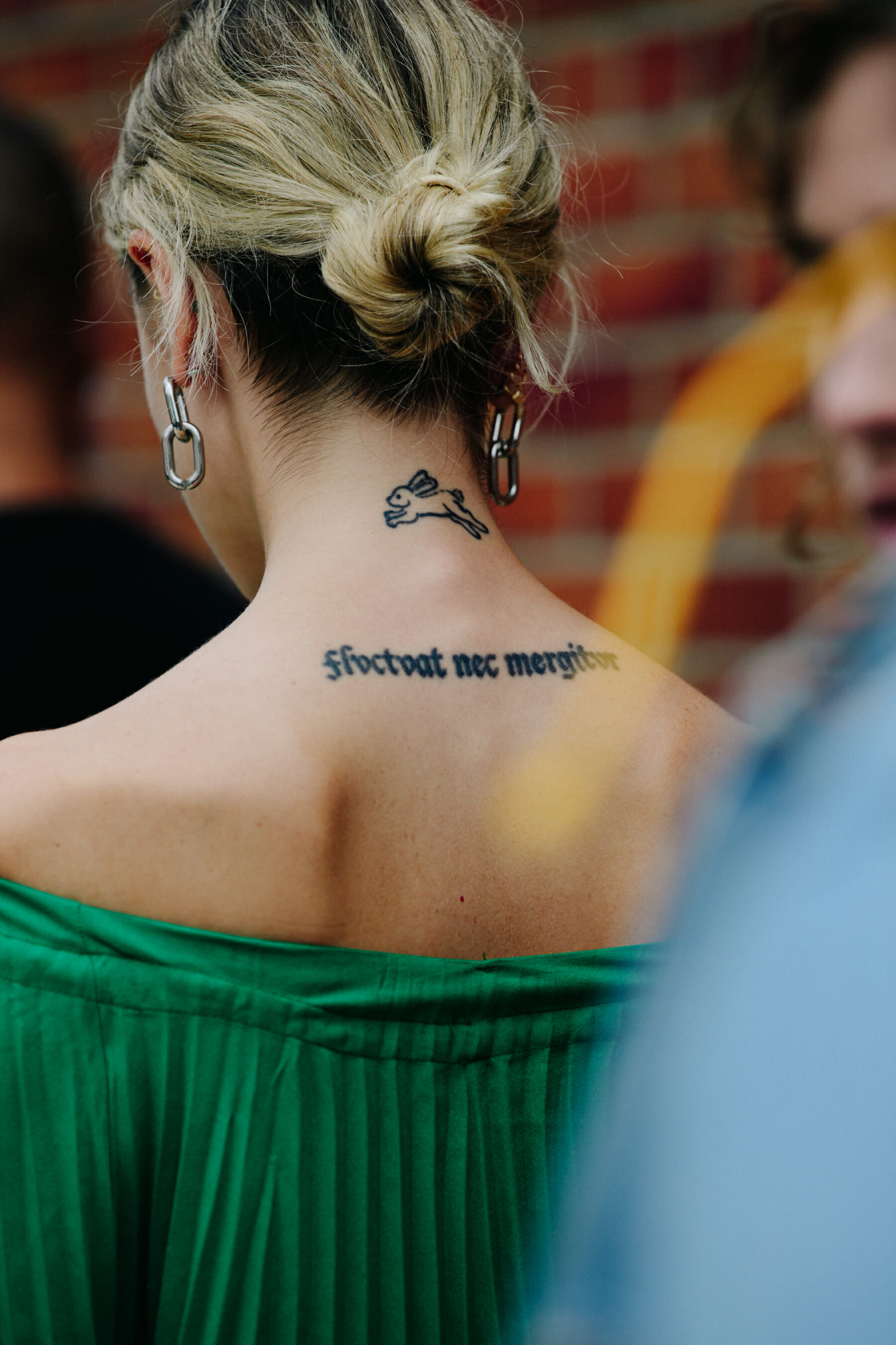 Woman with rabbit tattoo