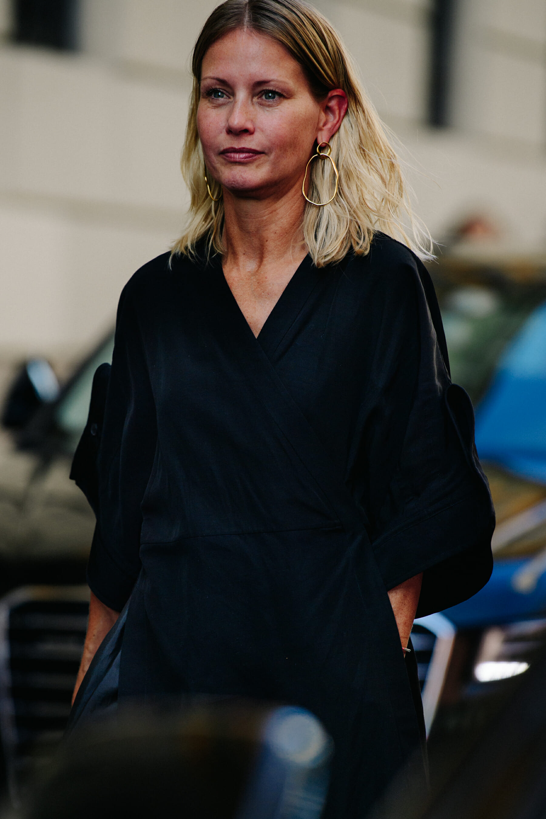 Woman wearing gold earrings