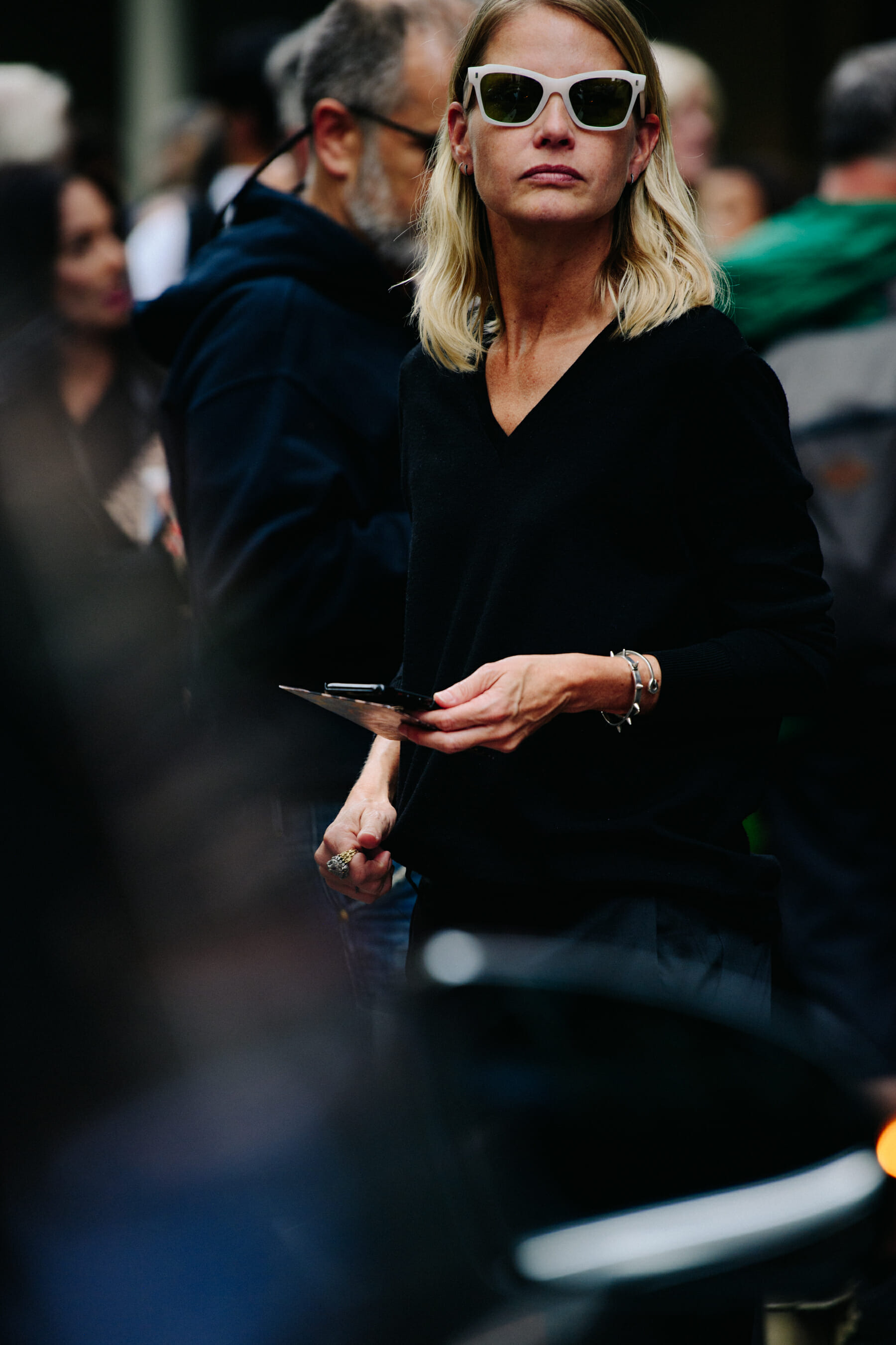 Woman wearing white sunglasses