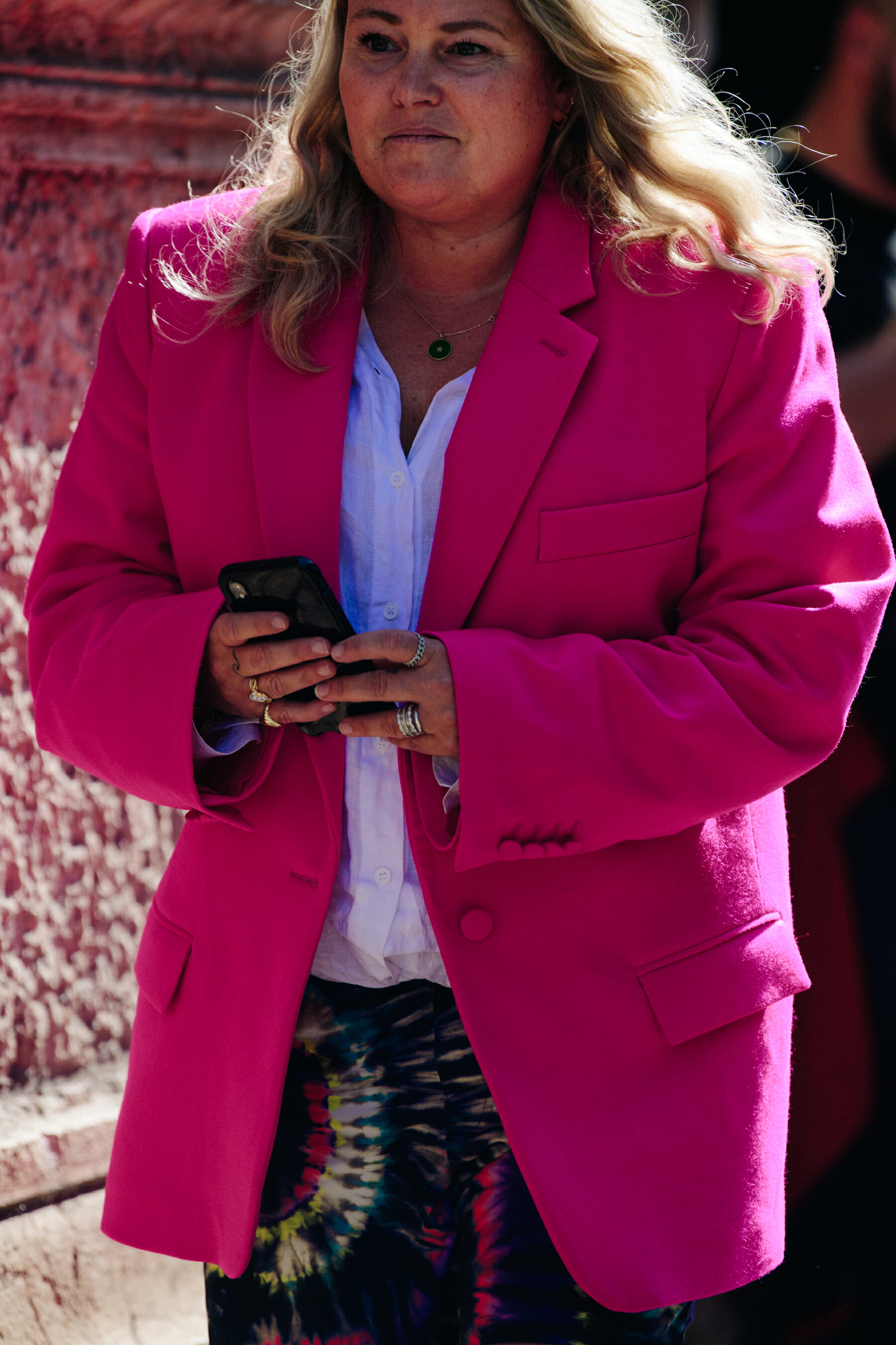 Woman wearing pink suit jacket