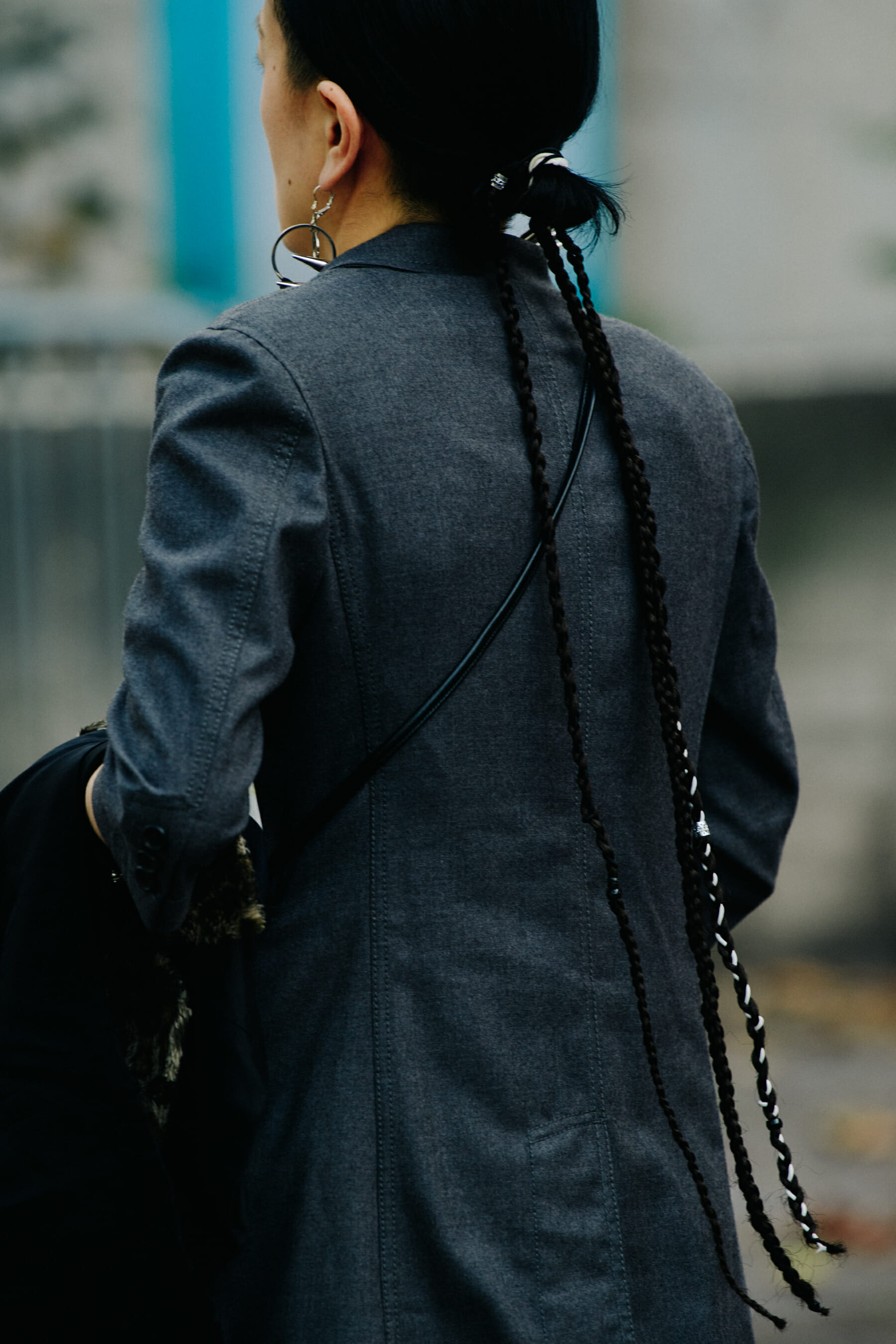 Woman wearing grey jacket