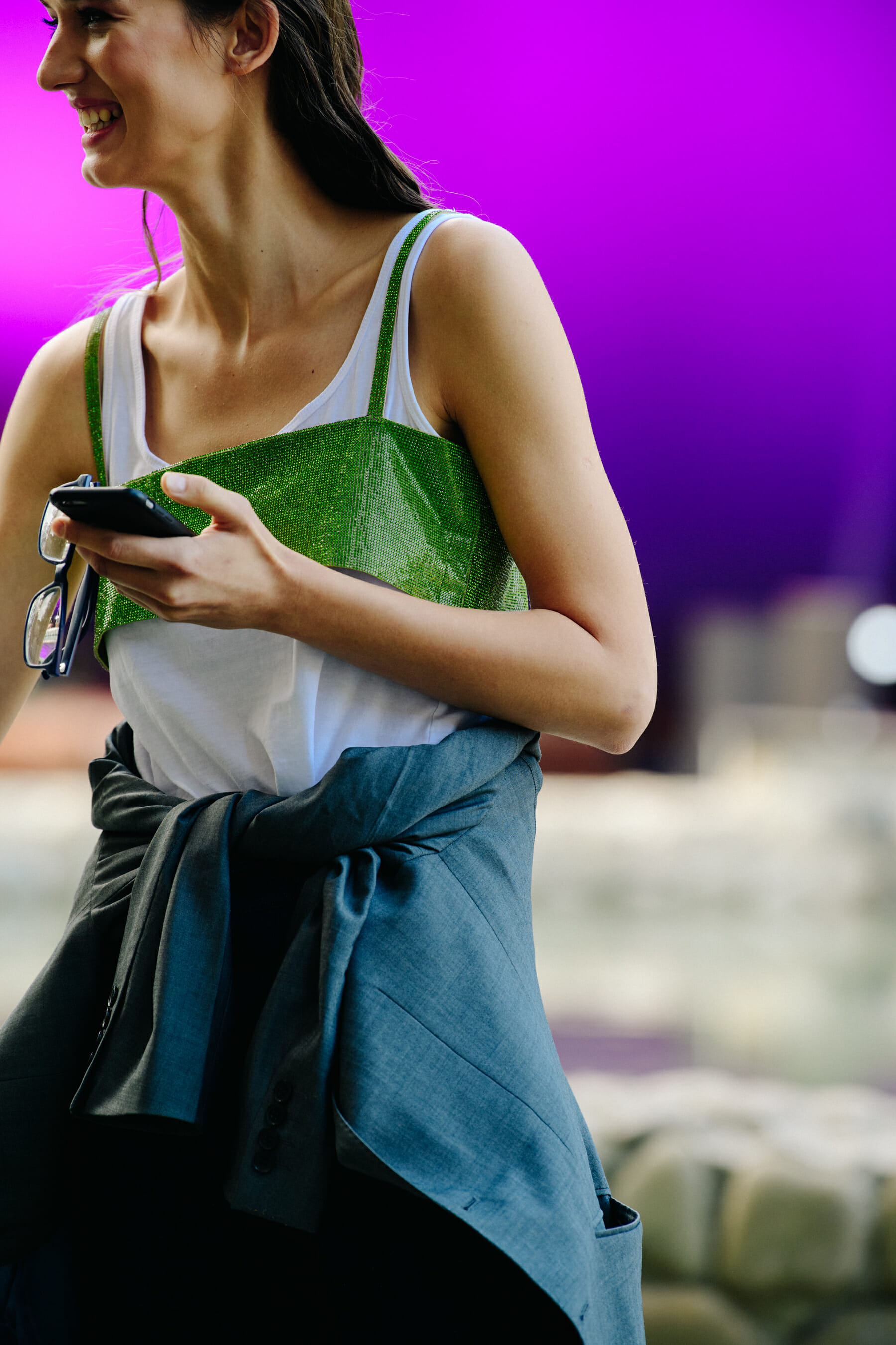Model wearing green crop top