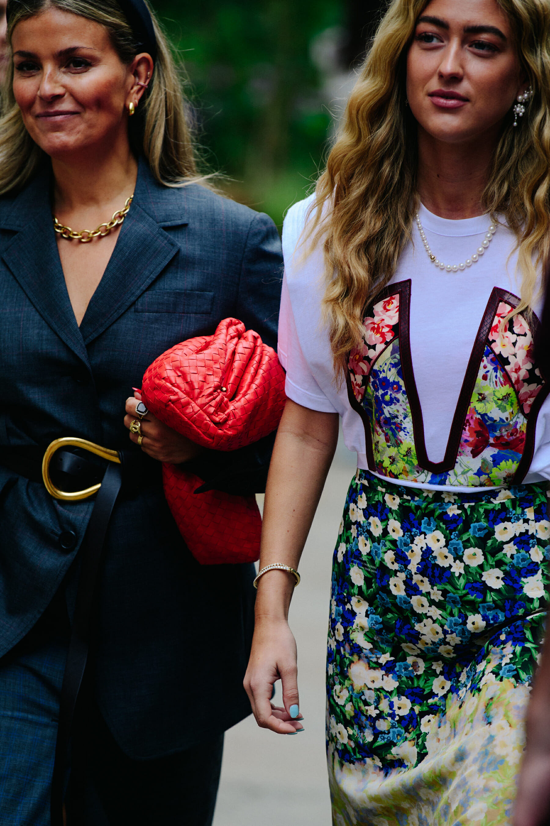 Two women wearing stylish outfits