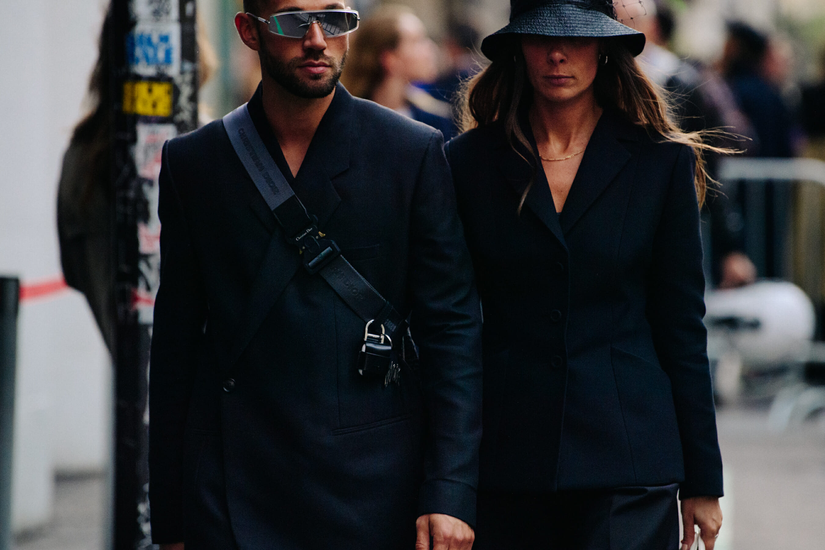 Couple wearing black suits
