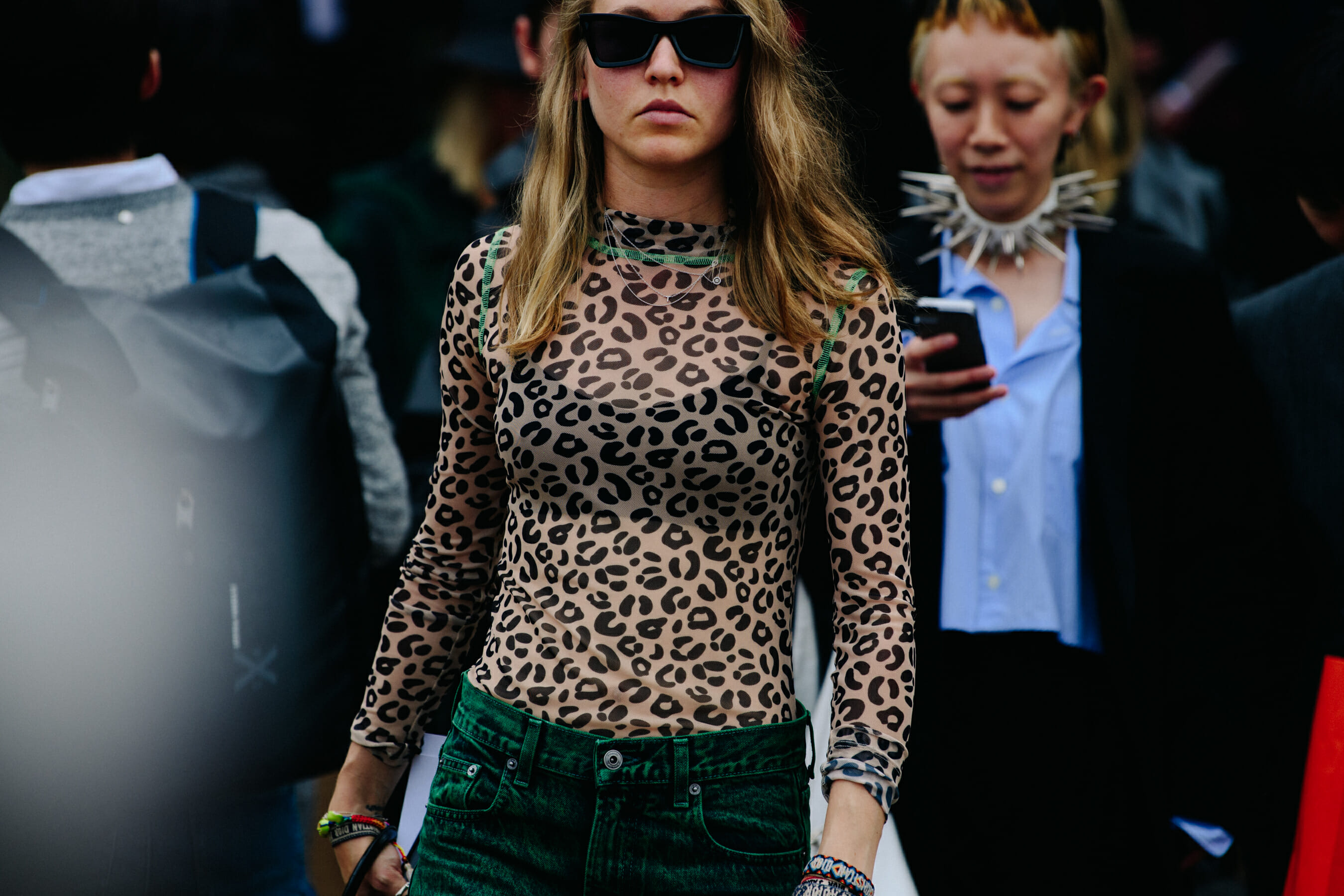 Woman wearing green jeans
