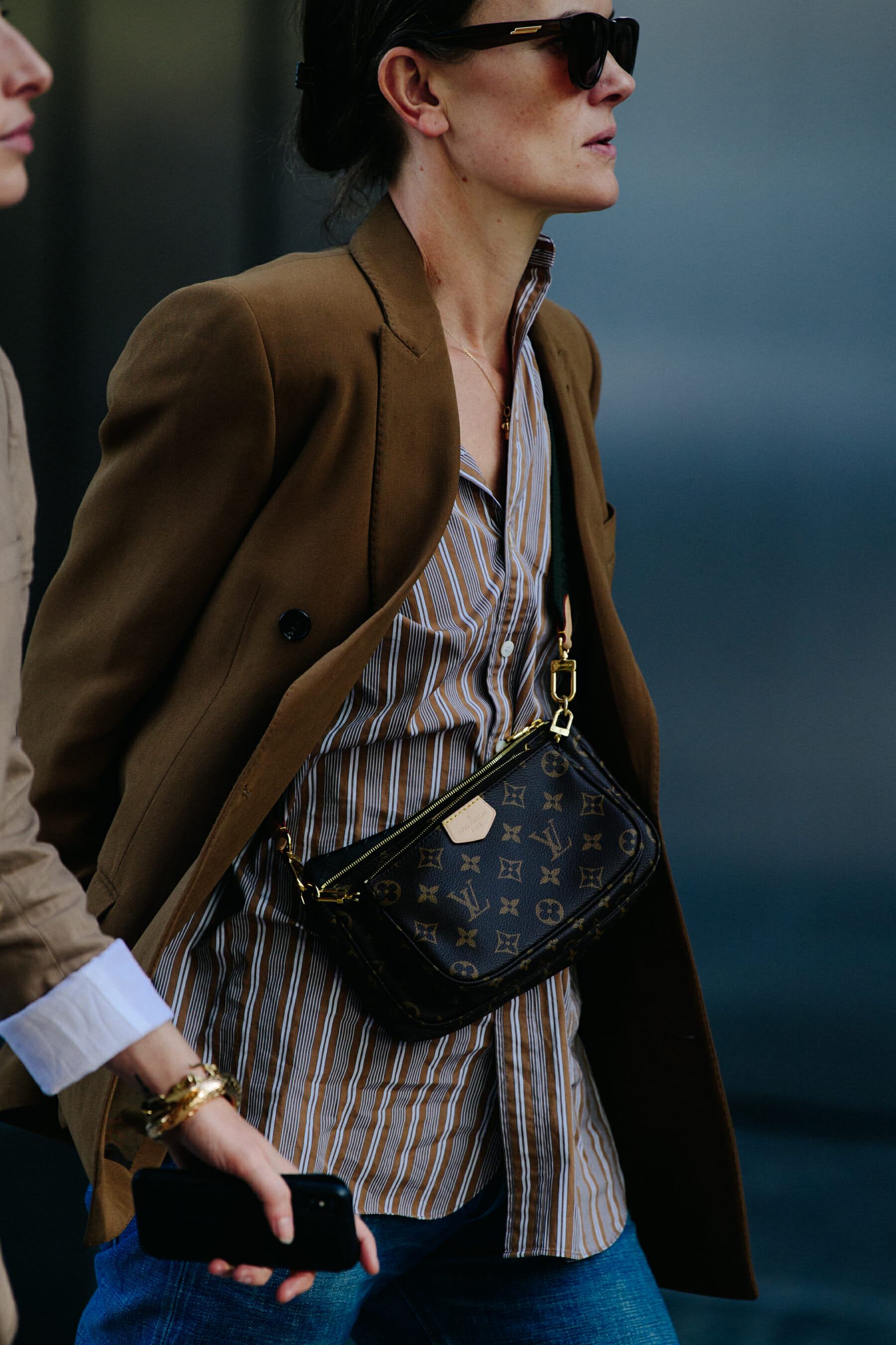 Woman wearing brown coat