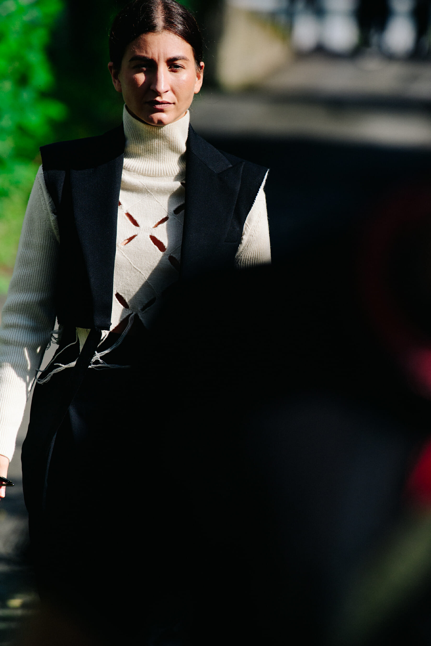 Woman wearing white wool top