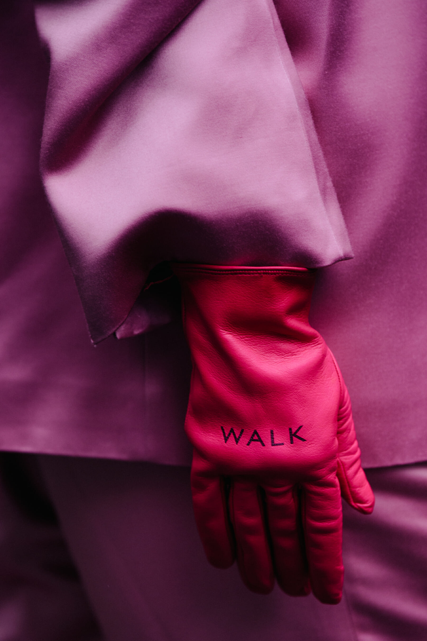 Woman wearing pink gloves