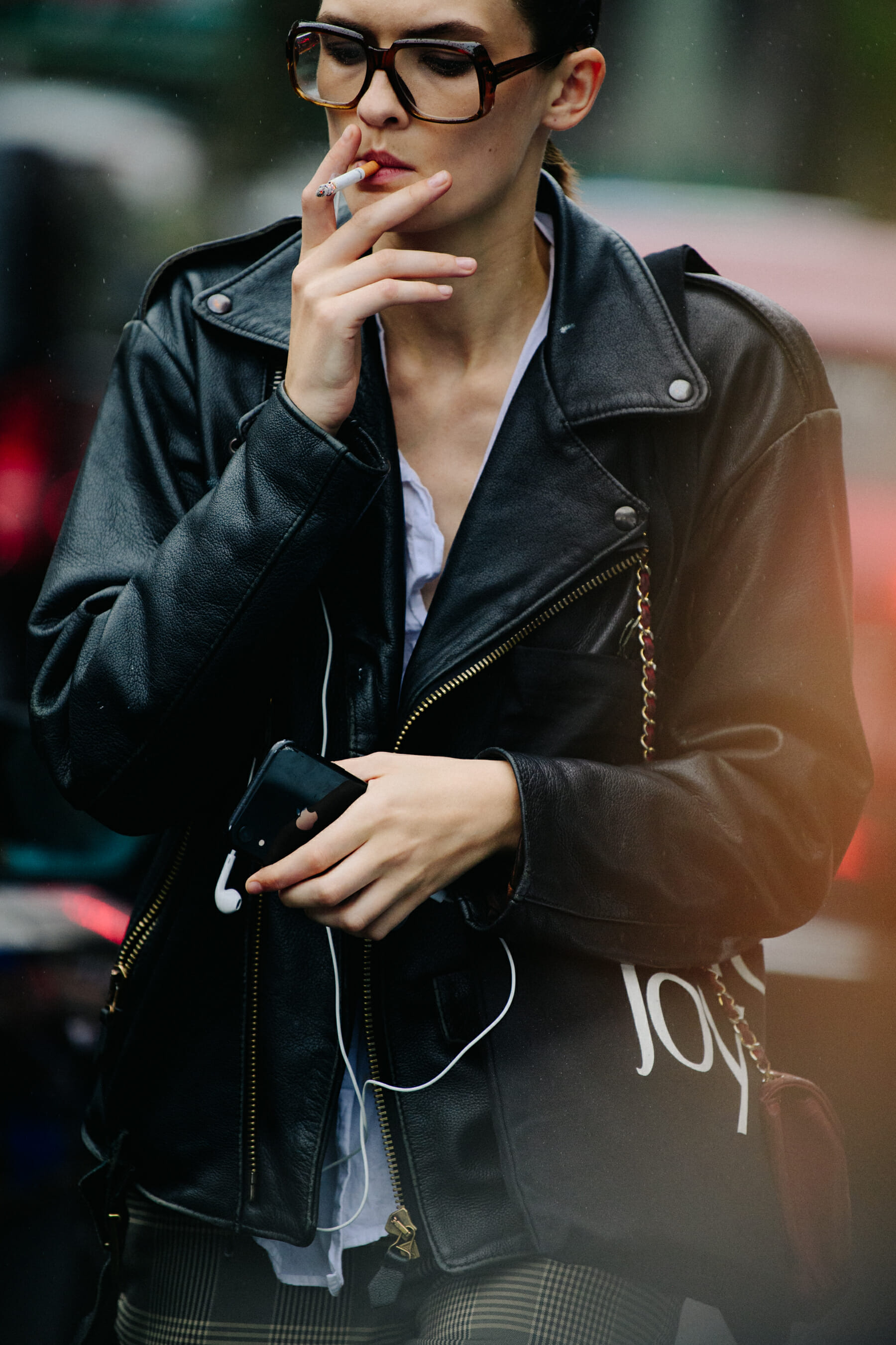 Woman wearing black leather jacket