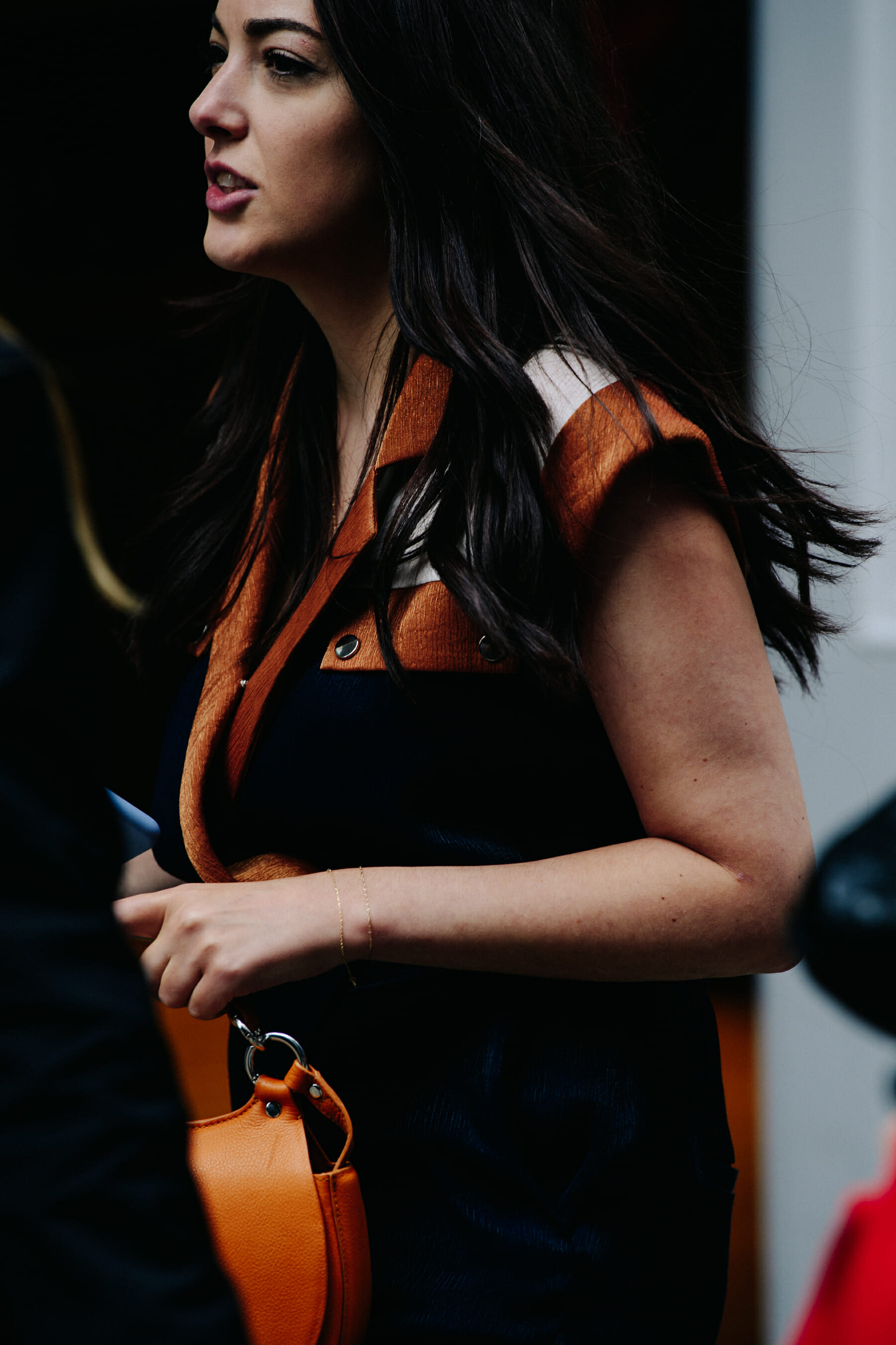 Woman wearing brown and white dress