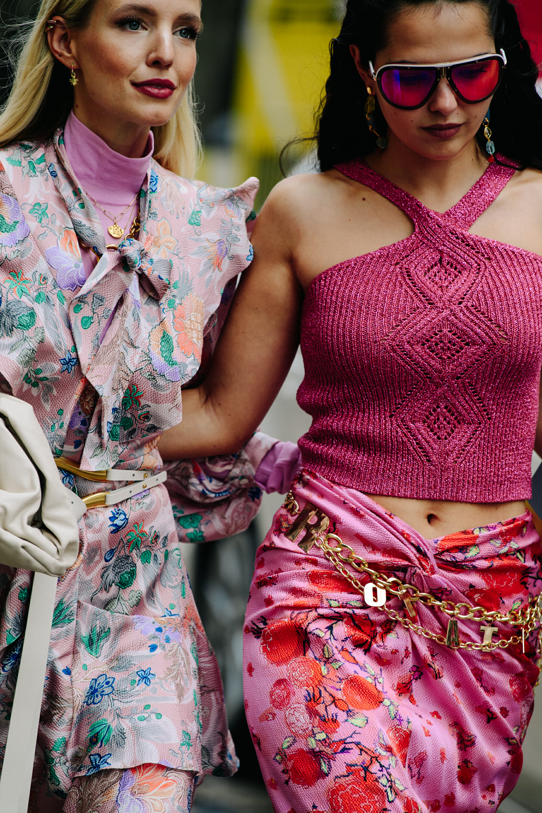Two women wearing pink