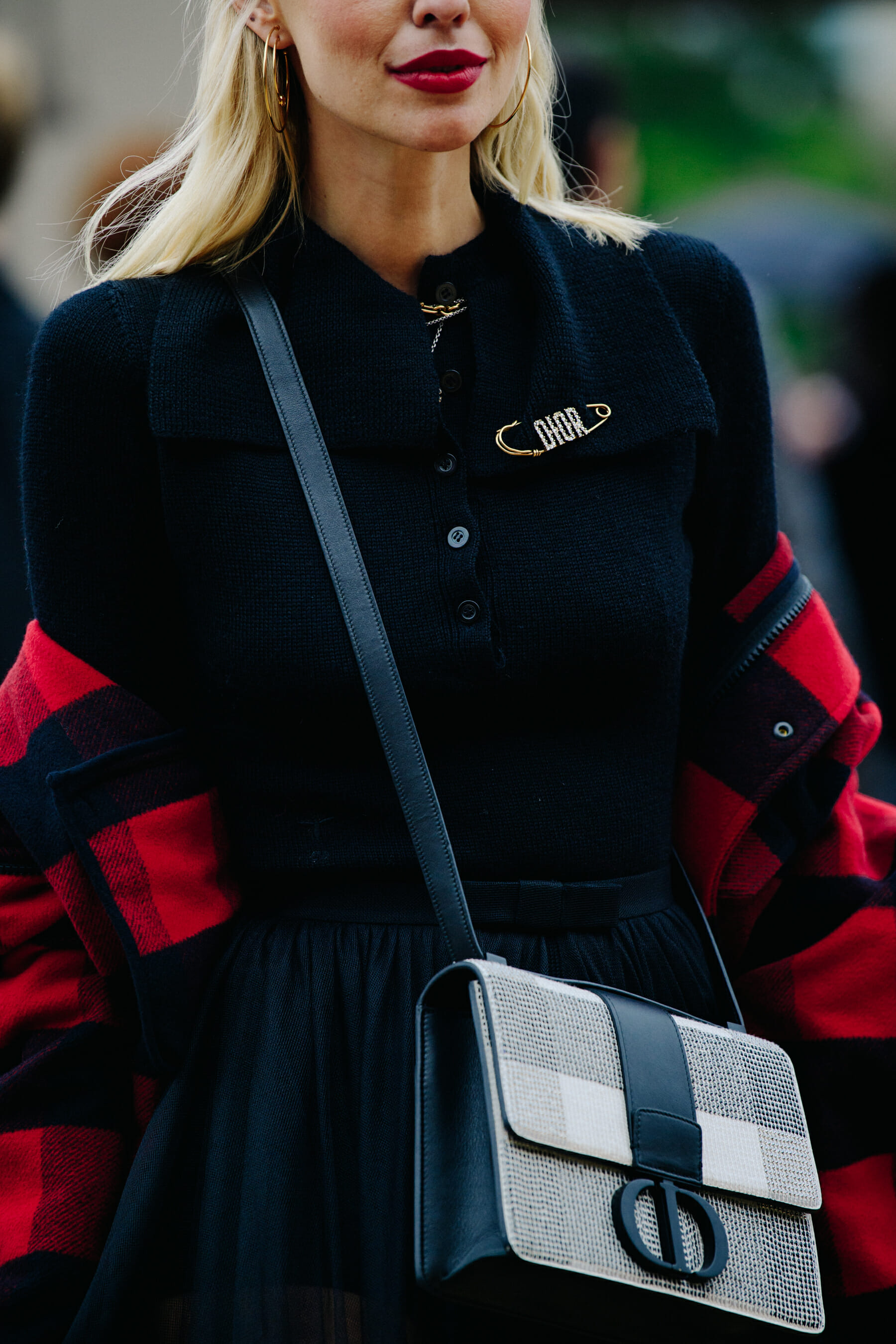 Woman wearing Christian Dior outfit