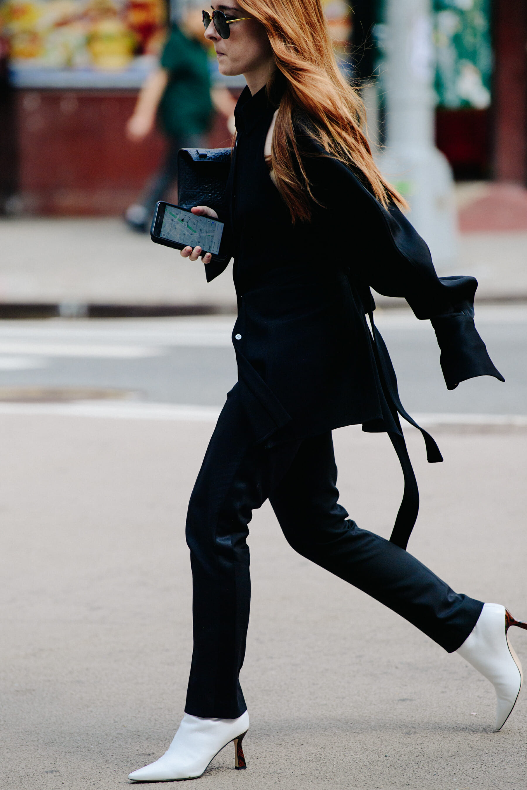 Woman wearing black suit