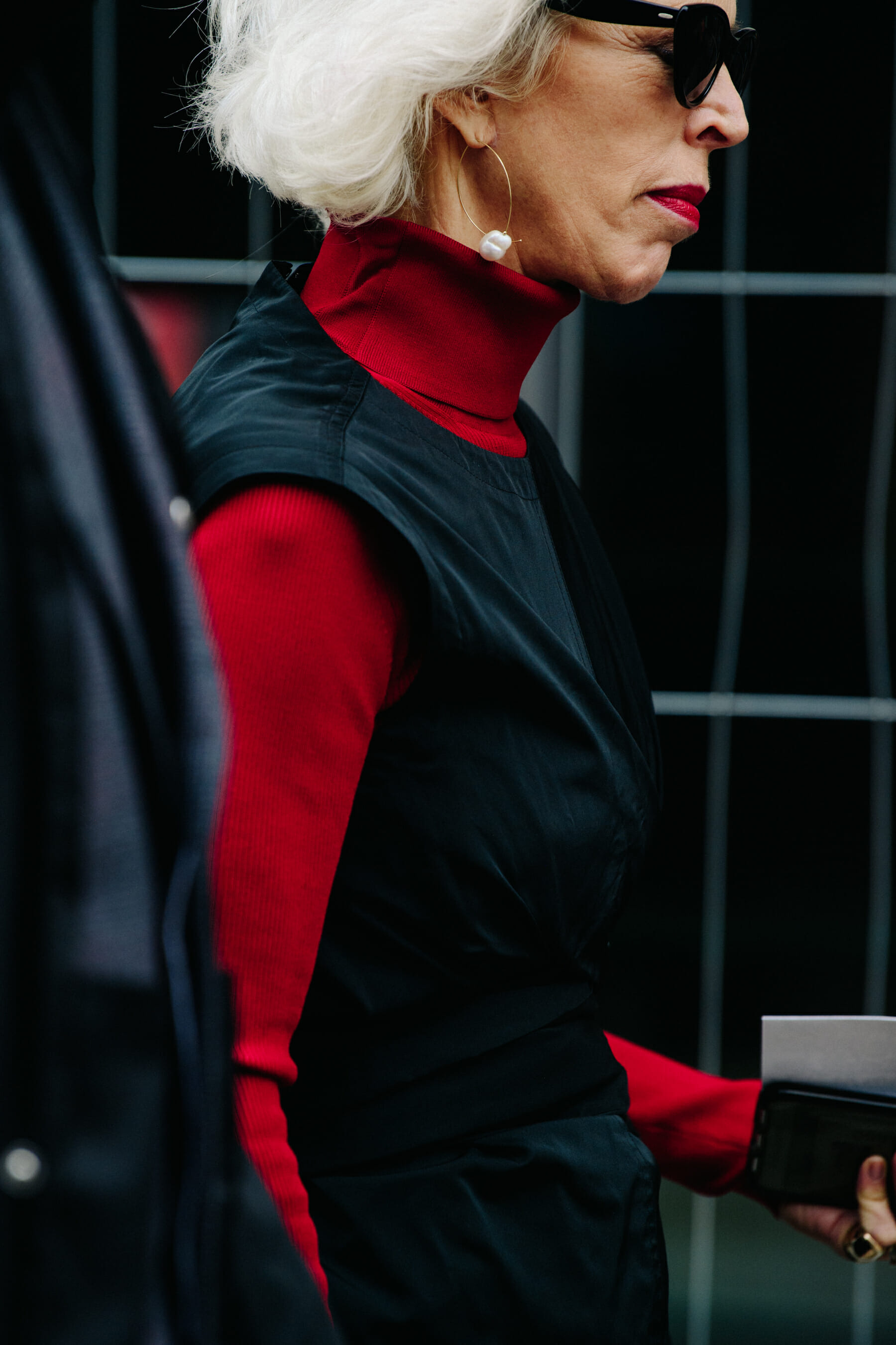 Woman wearing red and black