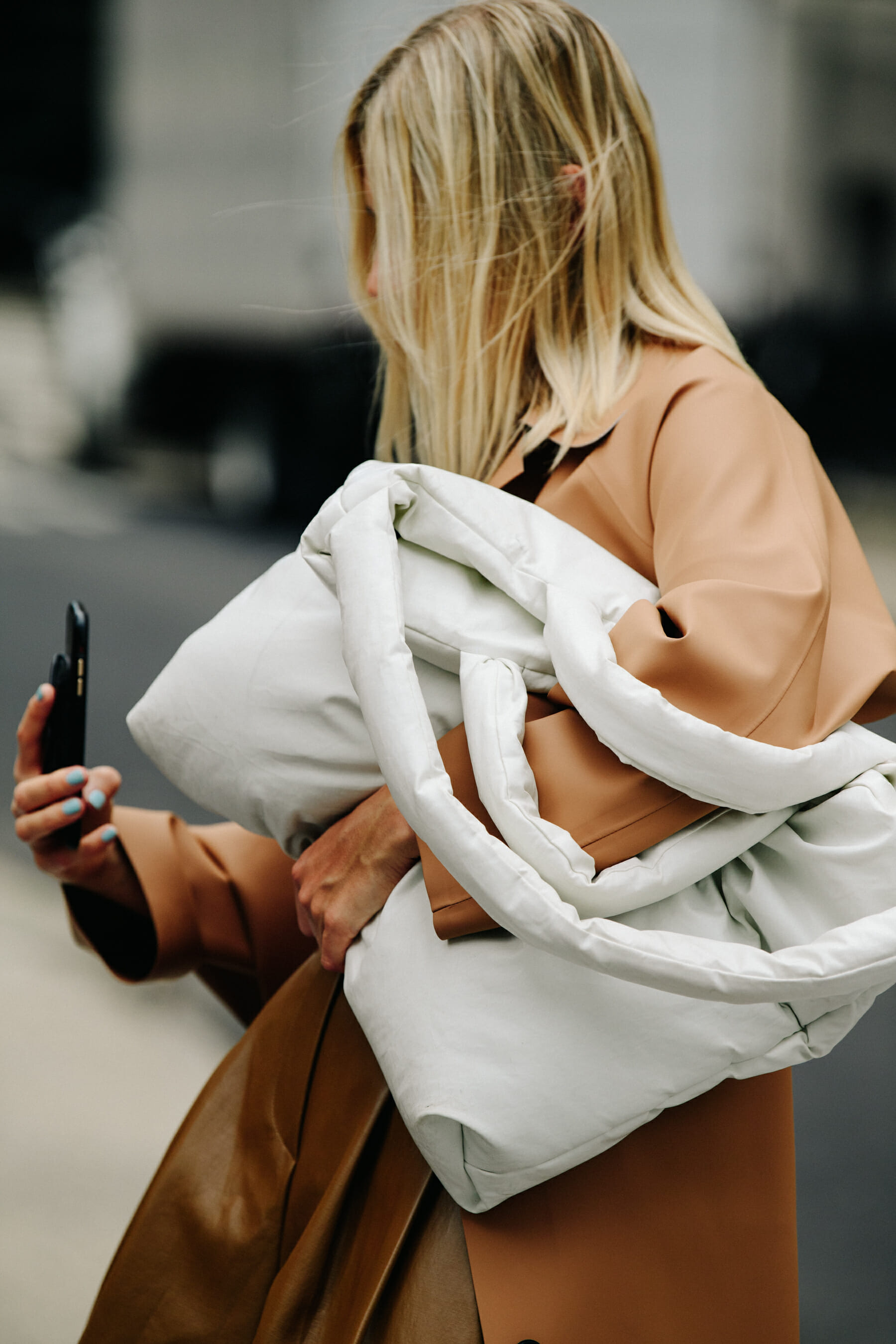 Woman wearing brown leather coat