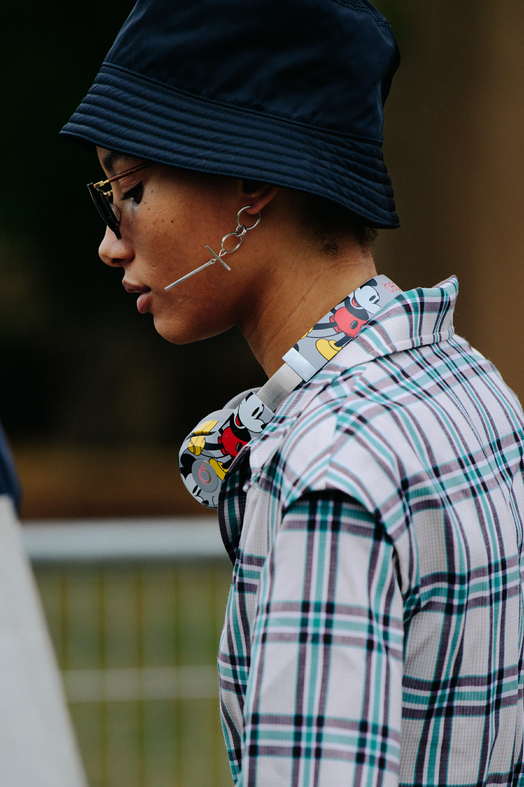 Model wearing Beats by Dre headphones