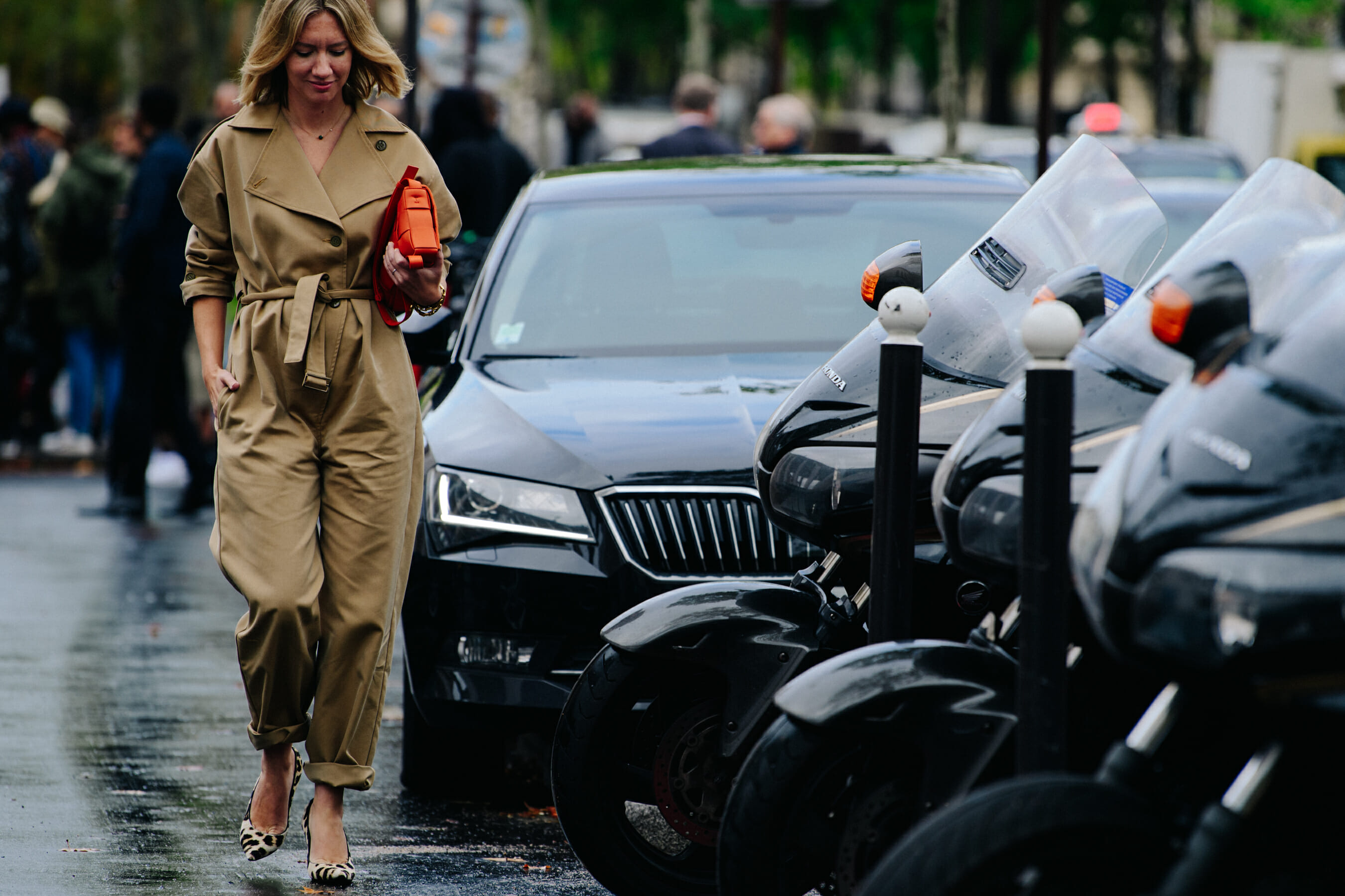 Woman wearing tan jumpsuit